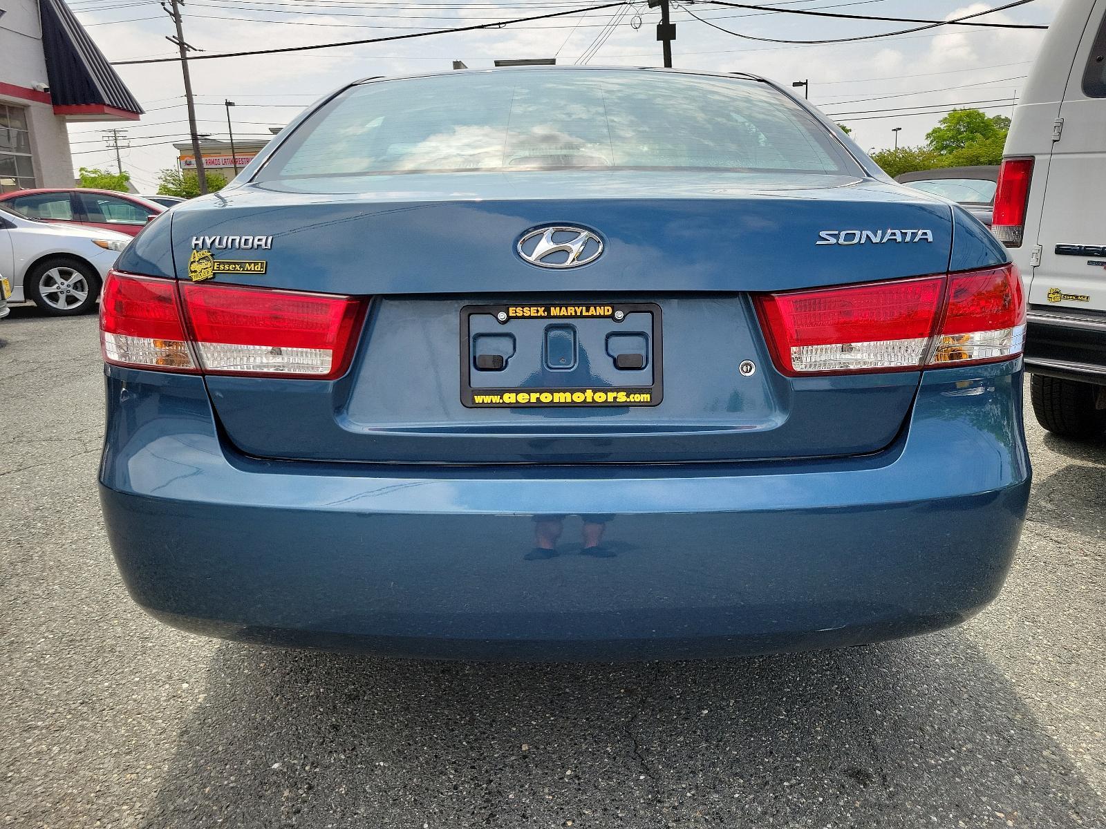 2006 Silver Blue - H1 /Gray - FZ Hyundai Sonata GLS (5NPEU46C46H) with an 2.4L DOHC MPI 16-valve I4 engine w/continuously variable valve timing (CVVT) engine, located at 50 Eastern Blvd., Essex, MD, 21221, (410) 686-3444, 39.304367, -76.484947 - Unveiling a meticulously maintained 2006 Hyundai Sonata GLS 4dr Sdn GLS i4 Auto that boasts an exquisite Silver Blue - H1 exterior with a refined Gray - FZ interior. This carefully used car is not just beautiful, but an equally dynamic performer, powered by a 2.4L DOHC MPI 16-valve I4 engine with Co - Photo #4