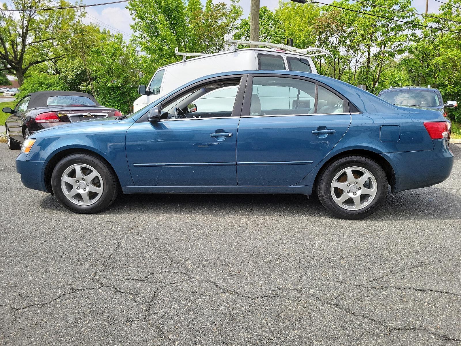 2006 Silver Blue - H1 /Gray - FZ Hyundai Sonata GLS (5NPEU46C46H) with an 2.4L DOHC MPI 16-valve I4 engine w/continuously variable valve timing (CVVT) engine, located at 50 Eastern Blvd., Essex, MD, 21221, (410) 686-3444, 39.304367, -76.484947 - Unveiling a meticulously maintained 2006 Hyundai Sonata GLS 4dr Sdn GLS i4 Auto that boasts an exquisite Silver Blue - H1 exterior with a refined Gray - FZ interior. This carefully used car is not just beautiful, but an equally dynamic performer, powered by a 2.4L DOHC MPI 16-valve I4 engine with Co - Photo #6