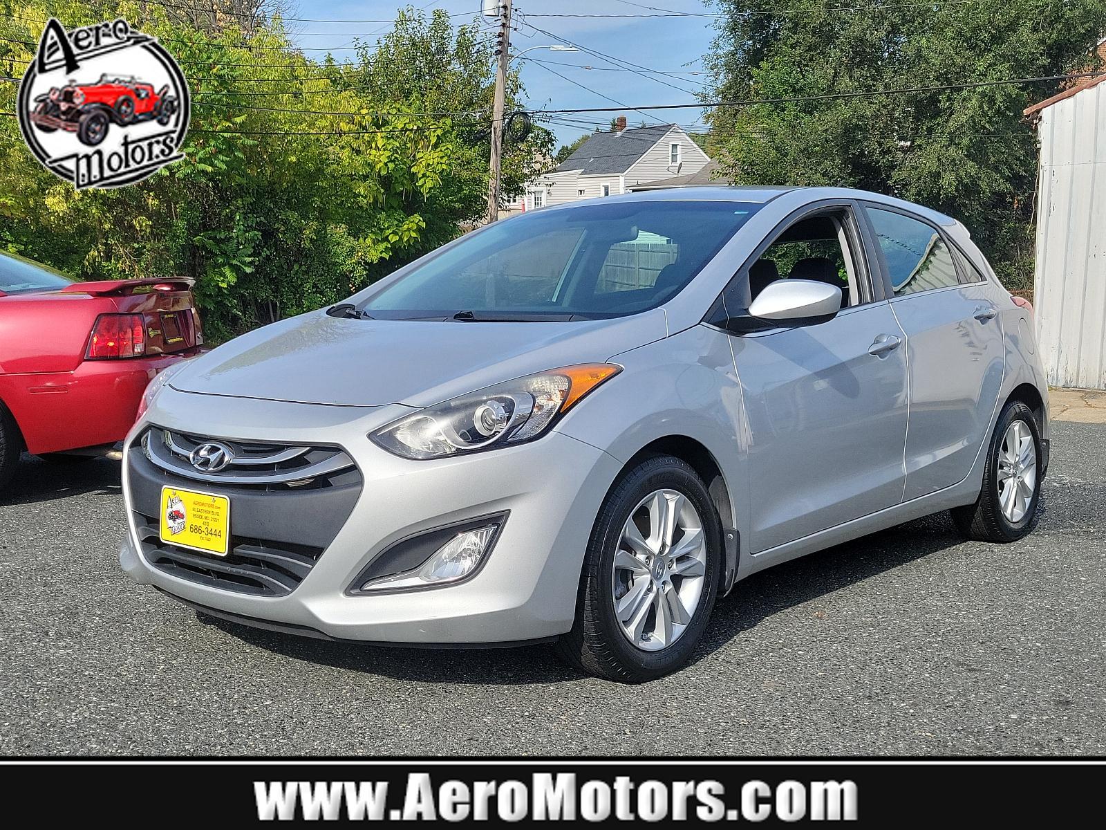 2014 Shimmering Silver - N3S /Black - RY Hyundai Elantra GT (KMHD35LH5EU) with an Engine: 2.0L GDI I4 engine, located at 50 Eastern Blvd., Essex, MD, 21221, (410) 686-3444, 39.304367, -76.484947 - Experience the perfect blend of style, comfort, and performance with this 2014 Hyundai Elantra GT 5dr HB Man. Coated in a radiant shimmering silver exterior, this hatchback stands out in a crowd while the sleek black interior exudes an aura of sophistication and elegance. Powered by a robust 2.0L GD - Photo #0