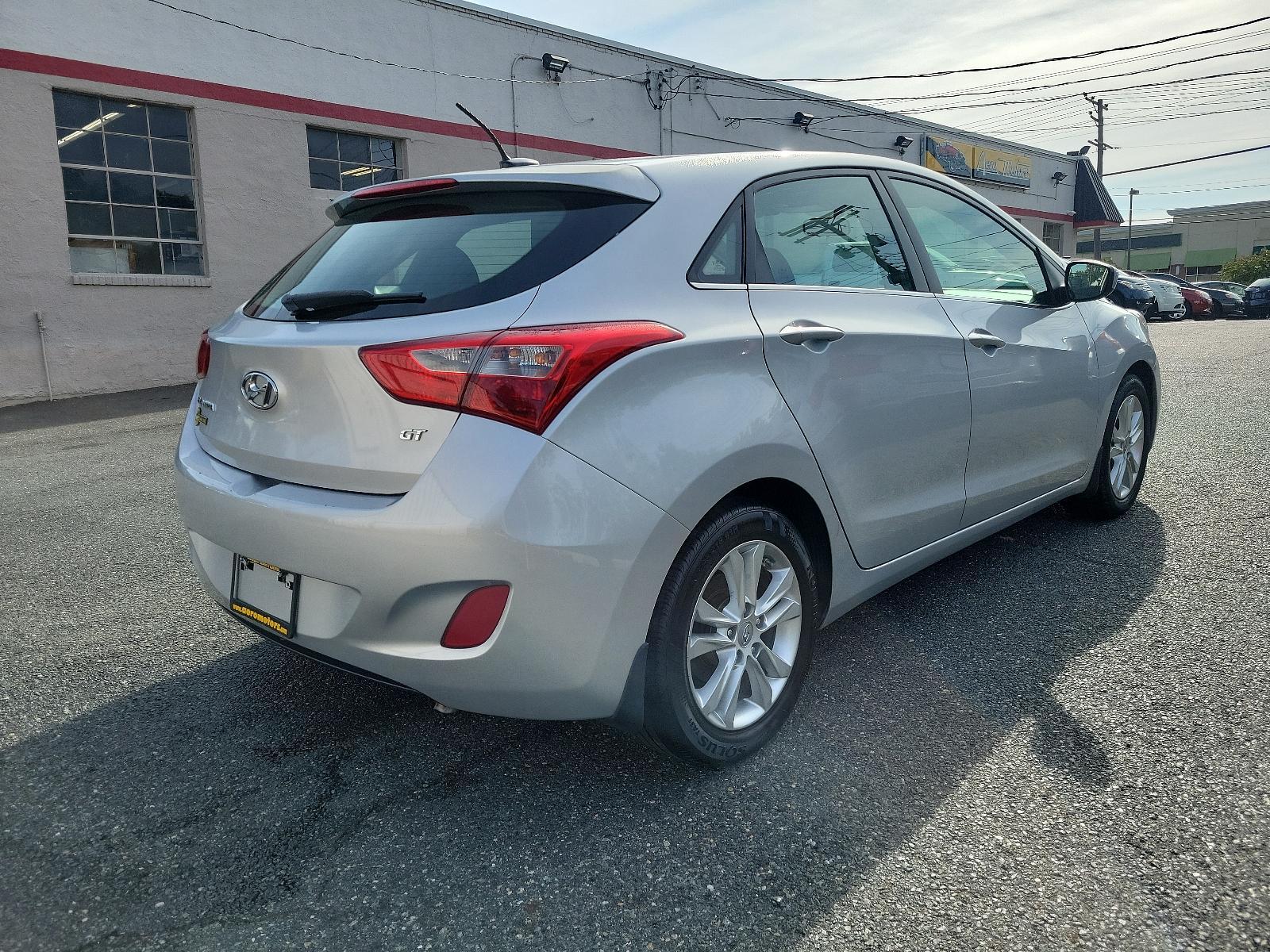 2014 Shimmering Silver - N3S /Black - RY Hyundai Elantra GT (KMHD35LH5EU) with an Engine: 2.0L GDI I4 engine, located at 50 Eastern Blvd., Essex, MD, 21221, (410) 686-3444, 39.304367, -76.484947 - Experience the perfect blend of style, comfort, and performance with this 2014 Hyundai Elantra GT 5dr HB Man. Coated in a radiant shimmering silver exterior, this hatchback stands out in a crowd while the sleek black interior exudes an aura of sophistication and elegance. Powered by a robust 2.0L GD - Photo #3