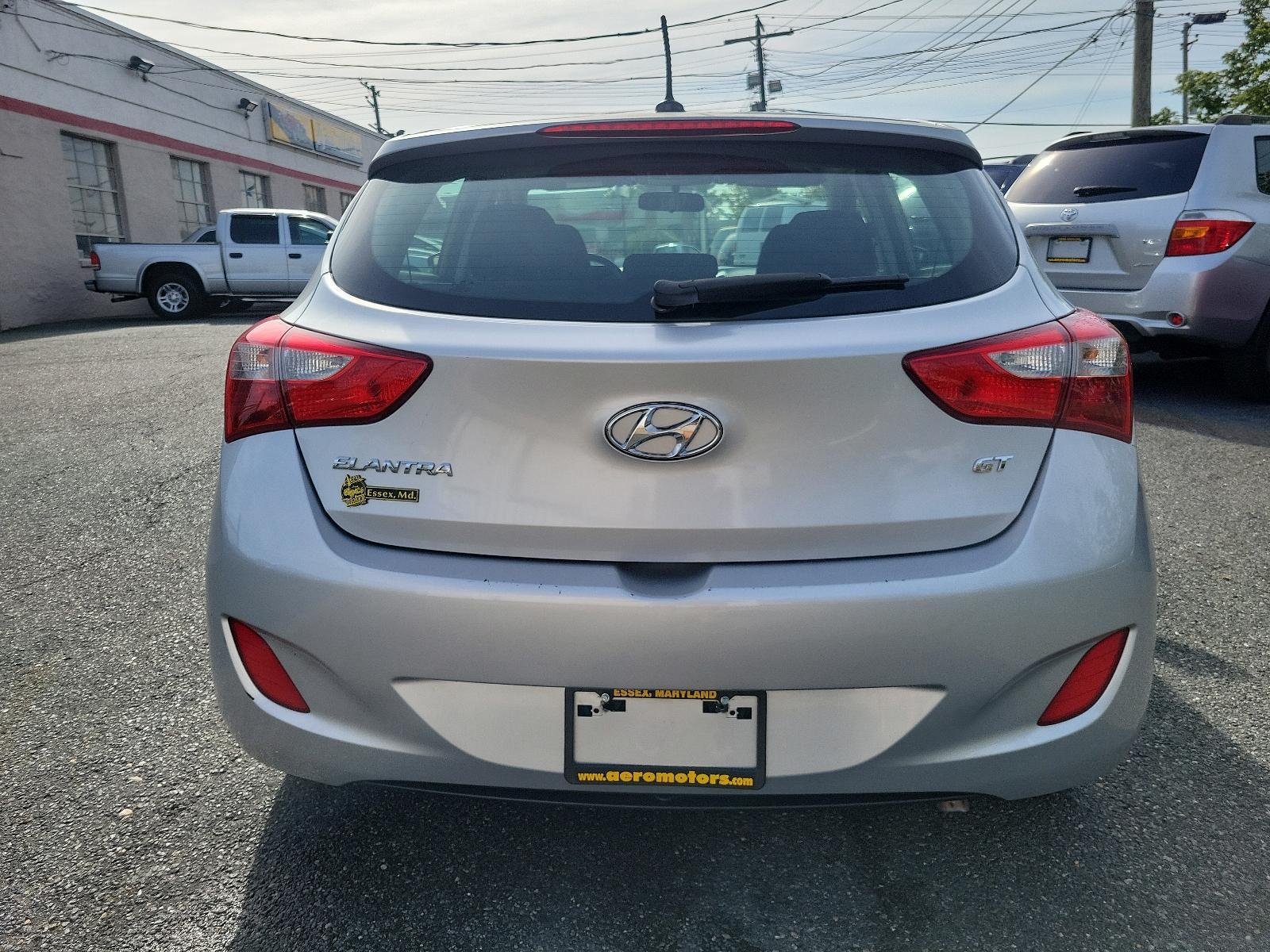 2014 Shimmering Silver - N3S /Black - RY Hyundai Elantra GT (KMHD35LH5EU) with an Engine: 2.0L GDI I4 engine, located at 50 Eastern Blvd., Essex, MD, 21221, (410) 686-3444, 39.304367, -76.484947 - Experience the perfect blend of style, comfort, and performance with this 2014 Hyundai Elantra GT 5dr HB Man. Coated in a radiant shimmering silver exterior, this hatchback stands out in a crowd while the sleek black interior exudes an aura of sophistication and elegance. Powered by a robust 2.0L GD - Photo #4