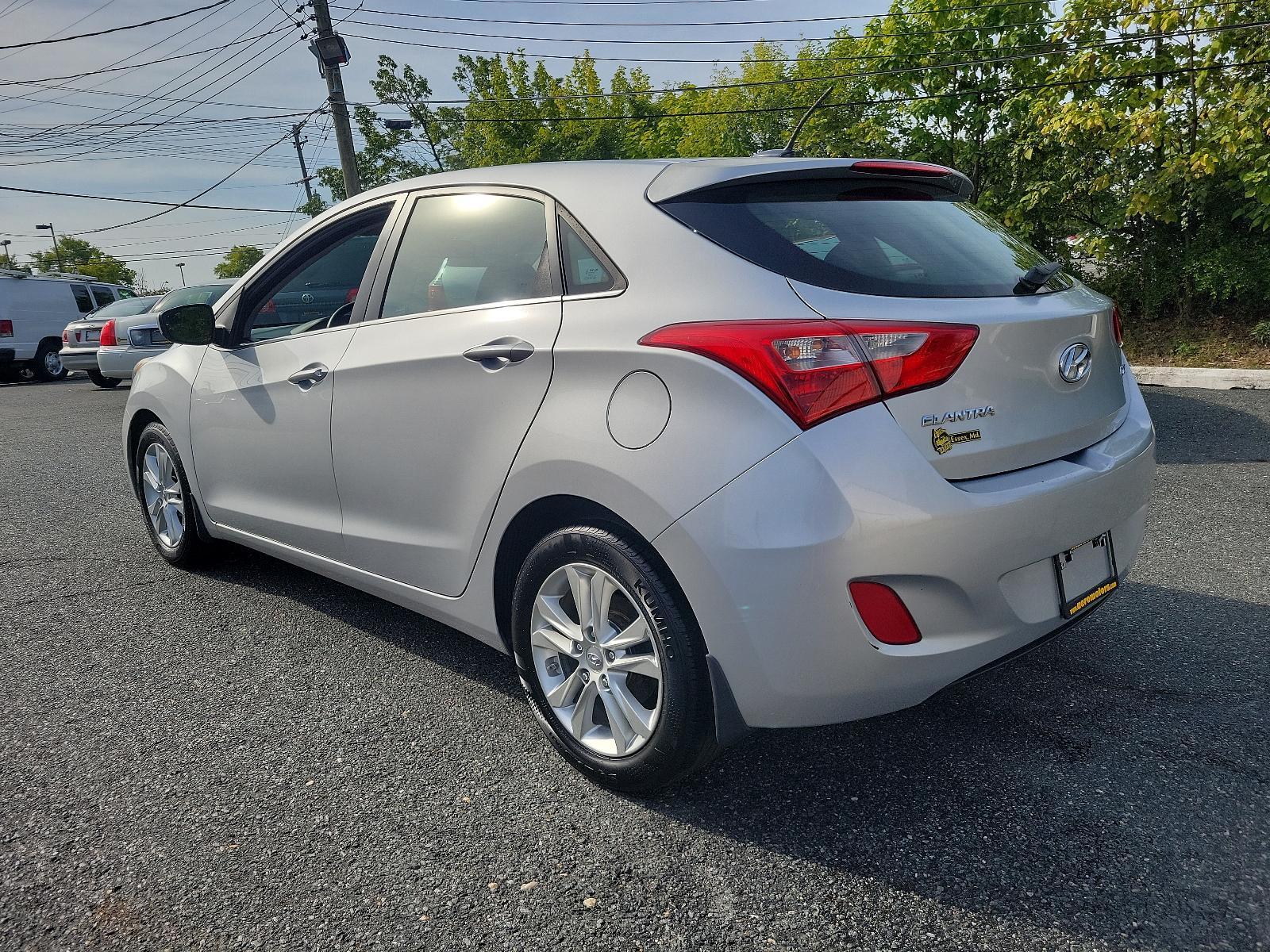 2014 Shimmering Silver - N3S /Black - RY Hyundai Elantra GT (KMHD35LH5EU) with an Engine: 2.0L GDI I4 engine, located at 50 Eastern Blvd., Essex, MD, 21221, (410) 686-3444, 39.304367, -76.484947 - Experience the perfect blend of style, comfort, and performance with this 2014 Hyundai Elantra GT 5dr HB Man. Coated in a radiant shimmering silver exterior, this hatchback stands out in a crowd while the sleek black interior exudes an aura of sophistication and elegance. Powered by a robust 2.0L GD - Photo #5