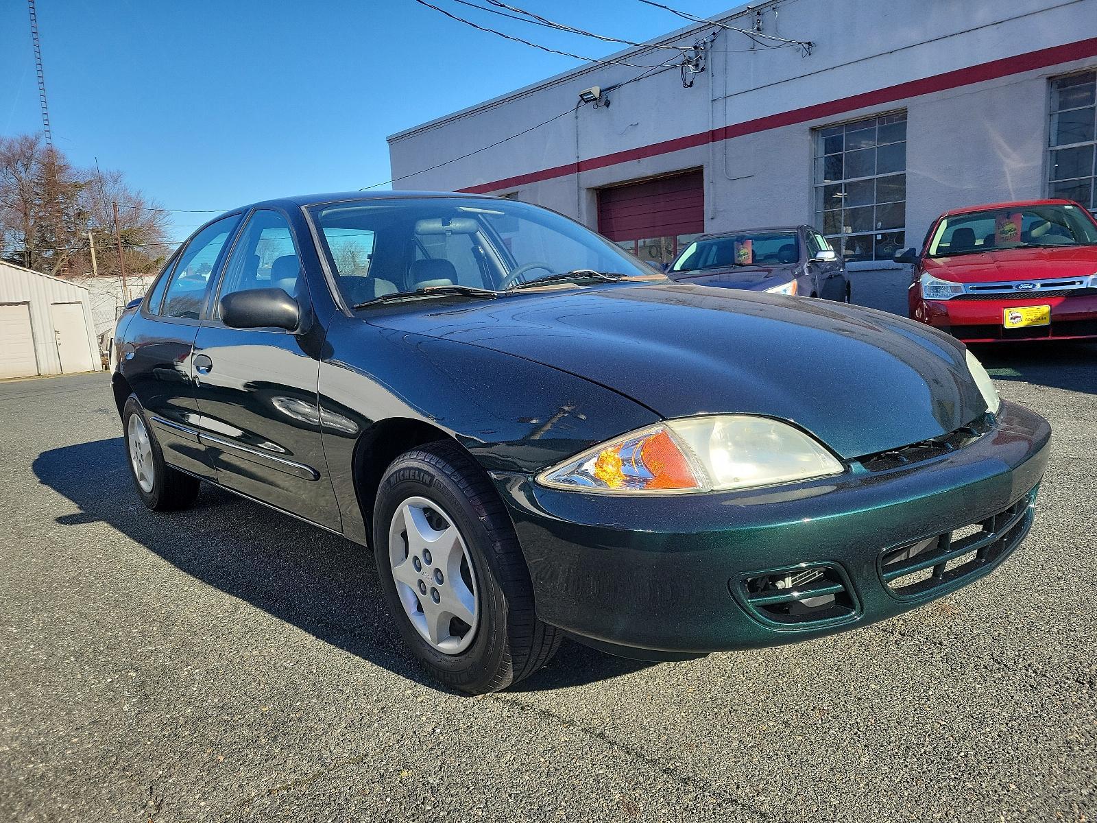 2002 Forest Green Metallic - 47U /Graphite - 12 Chevrolet Cavalier (1G1JC524327) with an 2.2L (134) SFI L4 2200 ENGINE engine, located at 50 Eastern Blvd., Essex, MD, 21221, (410) 686-3444, 39.304367, -76.484947 - Experience the appealing blend of practicality and performance in this 2002 Chevrolet Cavalier 4dr Sedan. Boasting a distinct Forest Green Metallic - 47U exterior, it turns heads with its timeless design and bold color. Plus, its Graphite - 12 interior offers uncompromised comfort and sophisticated - Photo #2