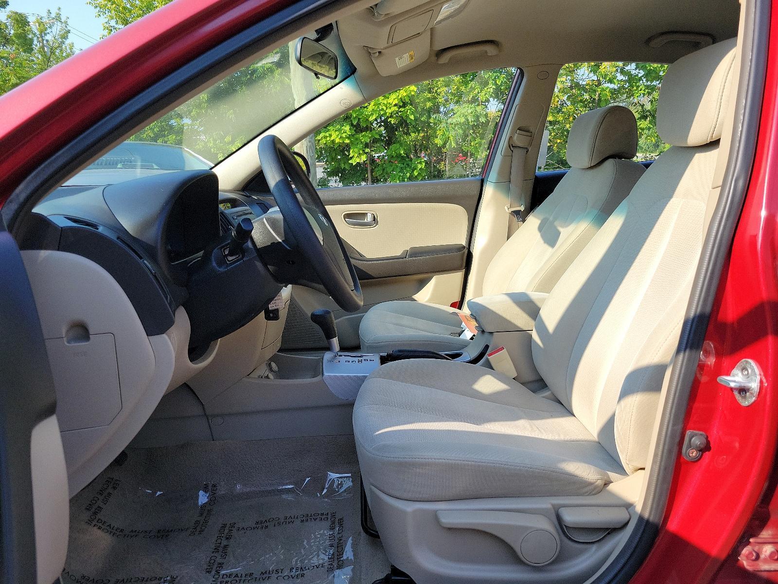 2008 Apple Red Pearl - ND /Beige - 9K Hyundai Elantra GLS (KMHDU46D48U) with an 2.0L DOHC CVVT 16-valve I4 engine engine, located at 50 Eastern Blvd., Essex, MD, 21221, (410) 686-3444, 39.304367, -76.484947 - Discover the impeccable marriage of efficiency and elegance in this 2008 Hyundai Elantra GLS 4dr Sedan. The stunning Apple Red Pearl exterior is sheer sophistication, ensuring a bold on-road presence. Inside, you are presented with an immaculate and welcoming Beige interior, exuding an aura of comfo - Photo #12