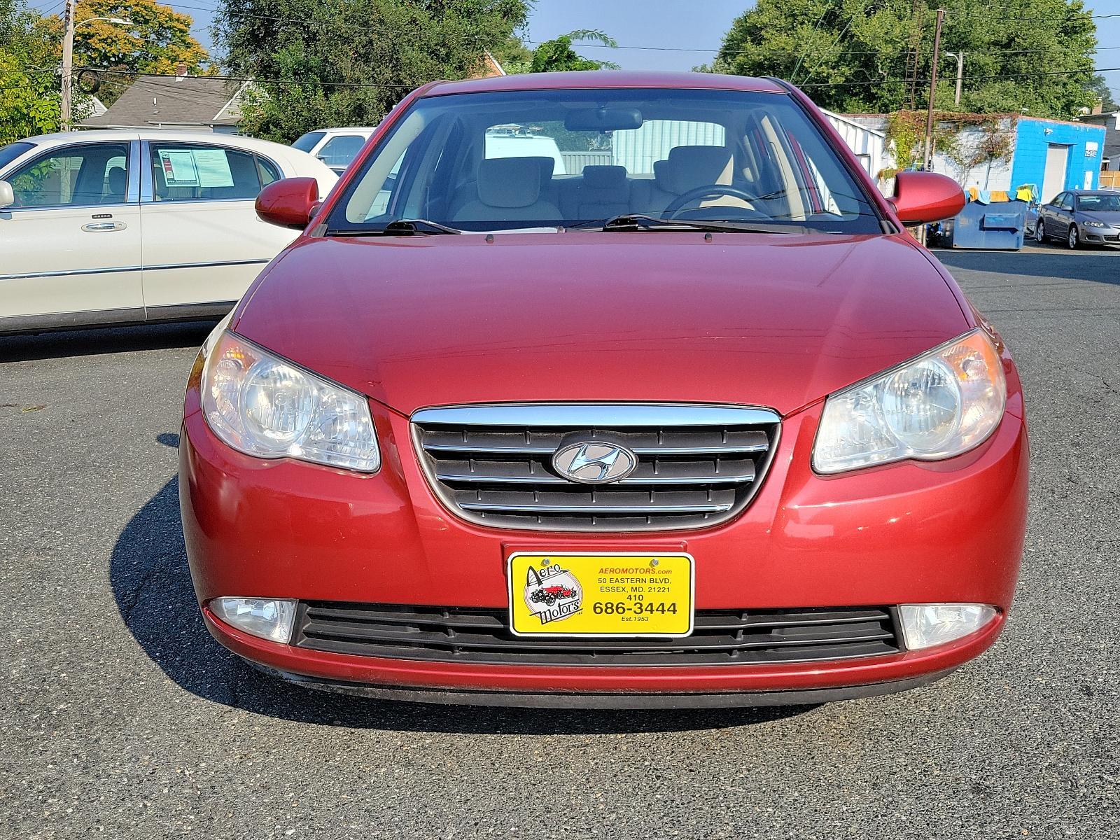 2008 Apple Red Pearl - ND /Beige - 9K Hyundai Elantra GLS (KMHDU46D48U) with an 2.0L DOHC CVVT 16-valve I4 engine engine, located at 50 Eastern Blvd., Essex, MD, 21221, (410) 686-3444, 39.304367, -76.484947 - Discover the impeccable marriage of efficiency and elegance in this 2008 Hyundai Elantra GLS 4dr Sedan. The stunning Apple Red Pearl exterior is sheer sophistication, ensuring a bold on-road presence. Inside, you are presented with an immaculate and welcoming Beige interior, exuding an aura of comfo - Photo #1