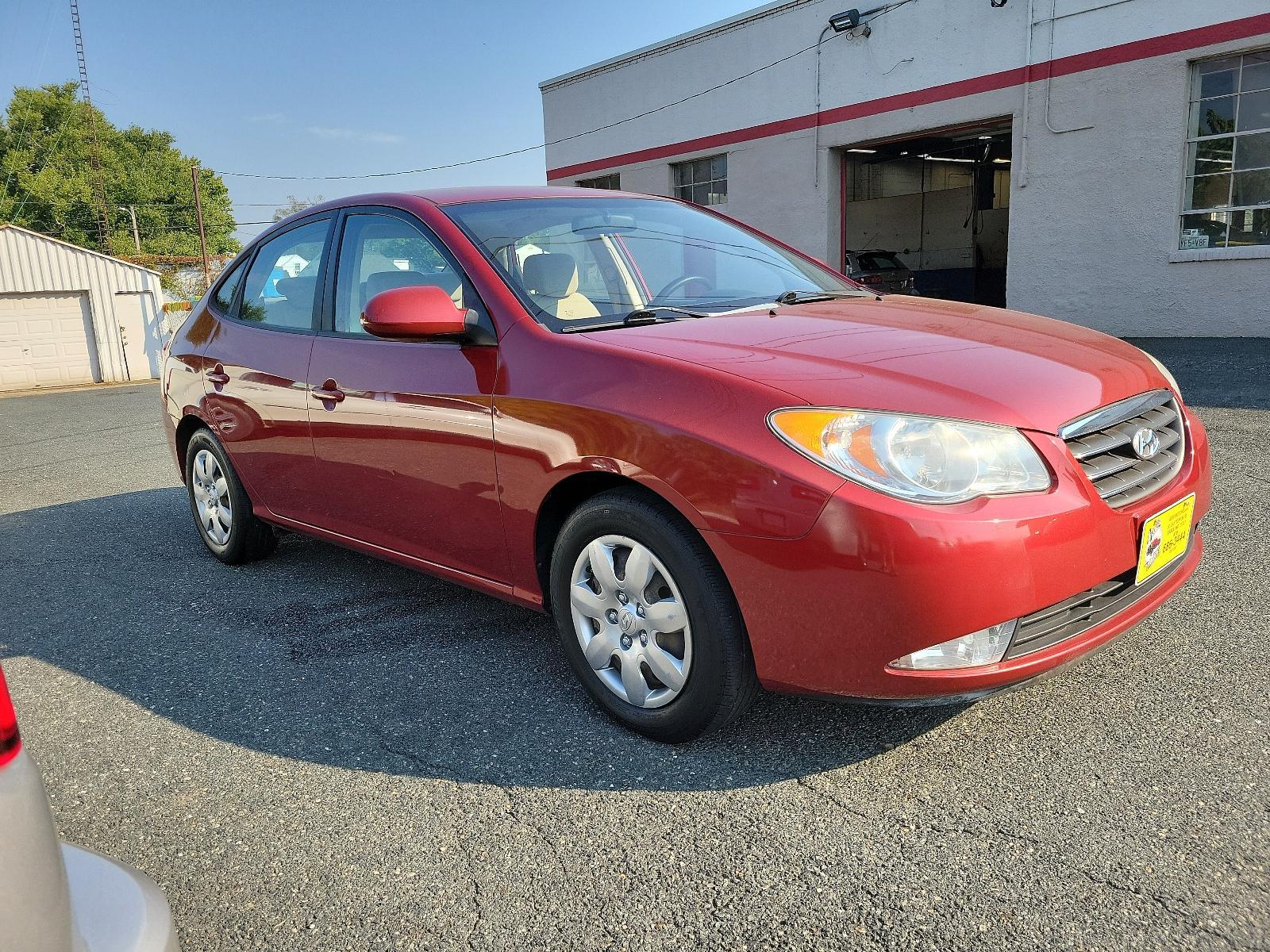 2008 Apple Red Pearl - ND /Beige - 9K Hyundai Elantra GLS (KMHDU46D48U) with an 2.0L DOHC CVVT 16-valve I4 engine engine, located at 50 Eastern Blvd., Essex, MD, 21221, (410) 686-3444, 39.304367, -76.484947 - Discover the impeccable marriage of efficiency and elegance in this 2008 Hyundai Elantra GLS 4dr Sedan. The stunning Apple Red Pearl exterior is sheer sophistication, ensuring a bold on-road presence. Inside, you are presented with an immaculate and welcoming Beige interior, exuding an aura of comfo - Photo #2