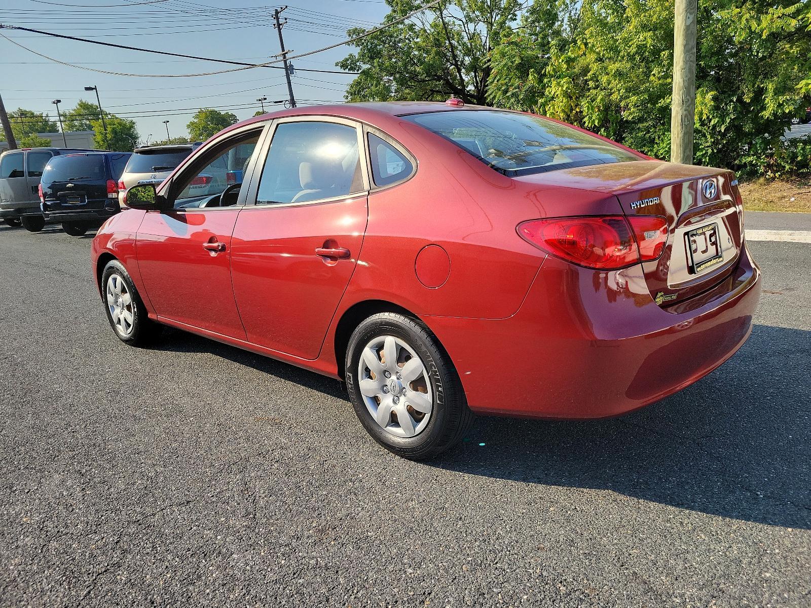 2008 Apple Red Pearl - ND /Beige - 9K Hyundai Elantra GLS (KMHDU46D48U) with an 2.0L DOHC CVVT 16-valve I4 engine engine, located at 50 Eastern Blvd., Essex, MD, 21221, (410) 686-3444, 39.304367, -76.484947 - Discover the impeccable marriage of efficiency and elegance in this 2008 Hyundai Elantra GLS 4dr Sedan. The stunning Apple Red Pearl exterior is sheer sophistication, ensuring a bold on-road presence. Inside, you are presented with an immaculate and welcoming Beige interior, exuding an aura of comfo - Photo #5