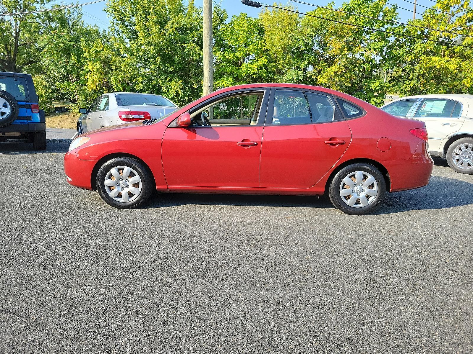 2008 Apple Red Pearl - ND /Beige - 9K Hyundai Elantra GLS (KMHDU46D48U) with an 2.0L DOHC CVVT 16-valve I4 engine engine, located at 50 Eastern Blvd., Essex, MD, 21221, (410) 686-3444, 39.304367, -76.484947 - Discover the impeccable marriage of efficiency and elegance in this 2008 Hyundai Elantra GLS 4dr Sedan. The stunning Apple Red Pearl exterior is sheer sophistication, ensuring a bold on-road presence. Inside, you are presented with an immaculate and welcoming Beige interior, exuding an aura of comfo - Photo #6