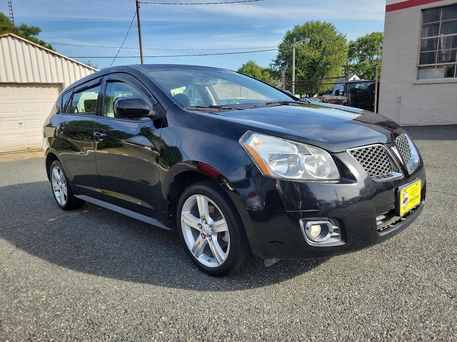 2009 Jet Black Metallic - 19U /Ebony - 14C Pontiac Vibe w/1SB (5Y2SP67059Z) with an ENGINE, 2.4L VARIABLE VALVE TIMING INTELLIGENCE 4-CYLINDER engine, located at 50 Eastern Blvd., Essex, MD, 21221, (410) 686-3444, 39.304367, -76.484947 - Rev up your daily commute with this stylish 2009 Pontiac Vibe w/1SB 4dr hb fwd w/1sb. Its radiant jet black metallic exterior and sophisticated ebony interior create a stunning visual contrast. Under the hood, the car is equipped with a 2.4L Variable Valve Timing Intelligence 4-Cylinder engine which - Photo #2