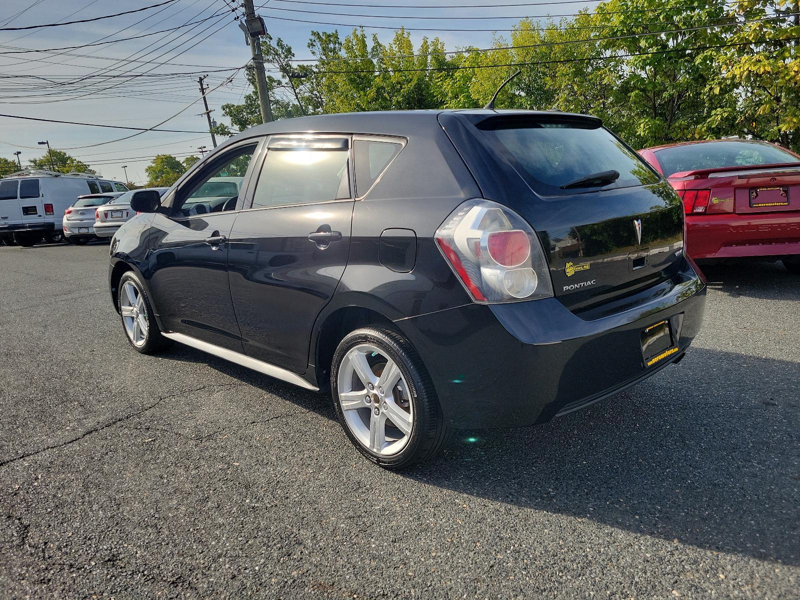 2009 Jet Black Metallic - 19U /Ebony - 14C Pontiac Vibe w/1SB (5Y2SP67059Z) with an ENGINE, 2.4L VARIABLE VALVE TIMING INTELLIGENCE 4-CYLINDER engine, located at 50 Eastern Blvd., Essex, MD, 21221, (410) 686-3444, 39.304367, -76.484947 - Rev up your daily commute with this stylish 2009 Pontiac Vibe w/1SB 4dr hb fwd w/1sb. Its radiant jet black metallic exterior and sophisticated ebony interior create a stunning visual contrast. Under the hood, the car is equipped with a 2.4L Variable Valve Timing Intelligence 4-Cylinder engine which - Photo #5