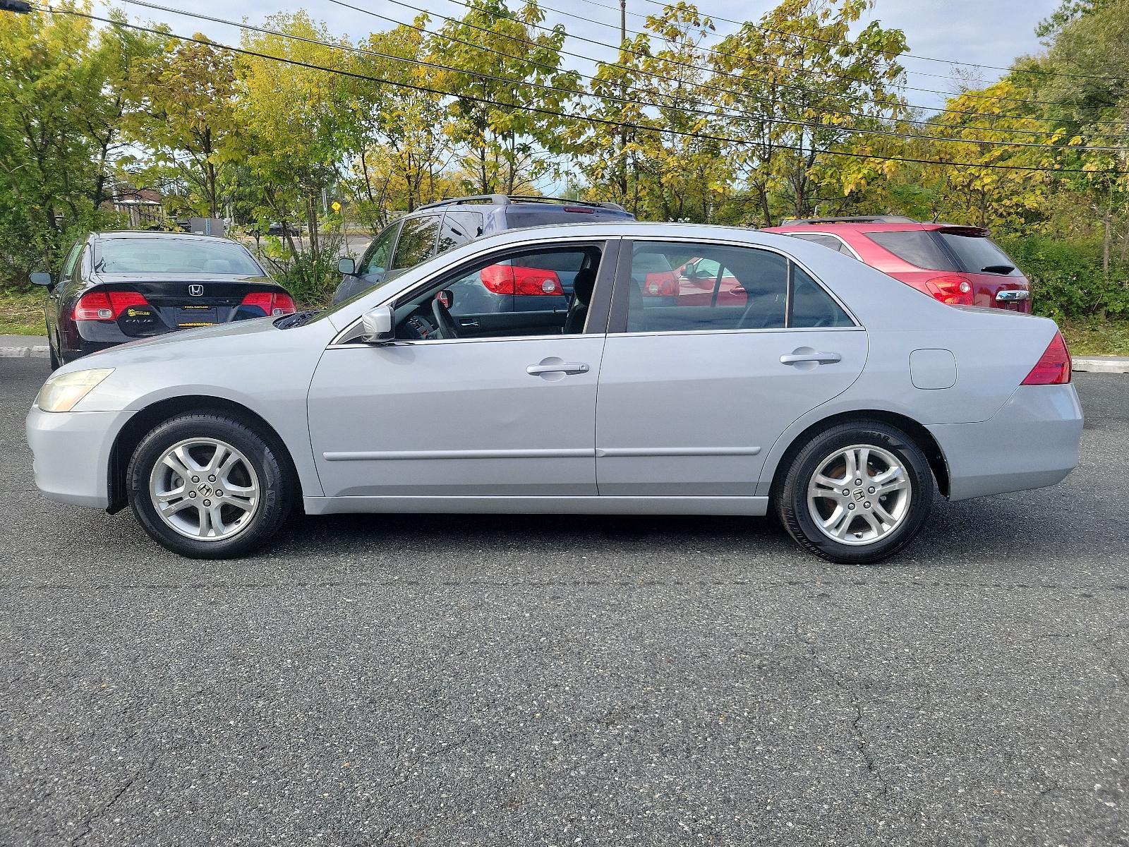 2006 Alabaster Silver Metallic - SI /Black - BK Honda Accord Sdn EX (1HGCM56766A) with an 2.4L DOHC MPFI 16-valve i-VTEC I4 engine engine, located at 50 Eastern Blvd., Essex, MD, 21221, (410) 686-3444, 39.304367, -76.484947 - Experience the synergy of comfort and reliability with this 2006 Honda Accord sedan. Dressed in a sleek silver exterior, this beauty exudes sophistication during every journey. While specific interior details are undefined, Honda is renowned for creating comfortable, highly-functional and user-frien - Photo #6