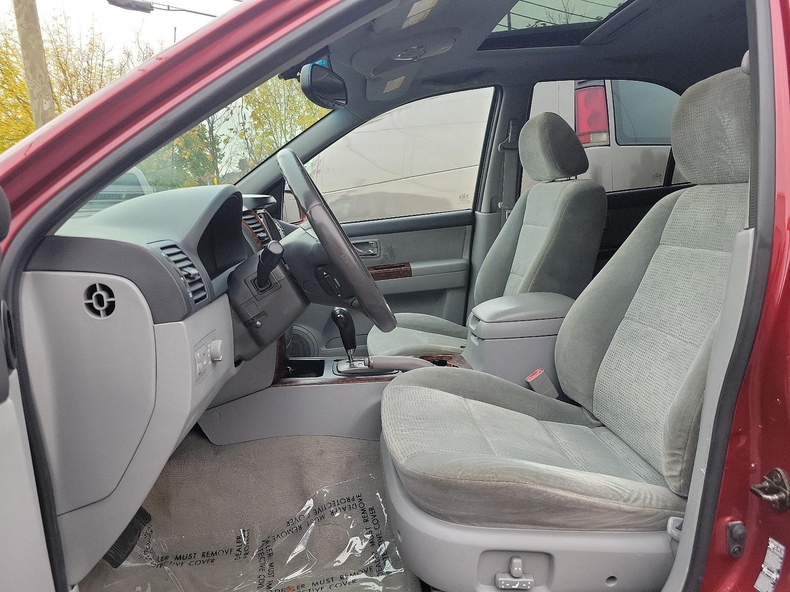 2005 Radiant Red - 3X /Gray - CY Kia Sorento EX (KNDJC733155) with an 3.5L DOHC MPFI 24-valve V6 engine engine, located at 50 Eastern Blvd., Essex, MD, 21221, (410) 686-3444, 39.304367, -76.484947 - Experience the dependable quality of this immaculate 2005 Kia Sorento EX 4dr ex 4wd auto. Boasting a radiant red 3x exterior, this stylish SUV surely stands out on the road. Step inside and appreciate the tastefully designed gray cy interior, offering comfort and functionality for all your travels. - Photo #12