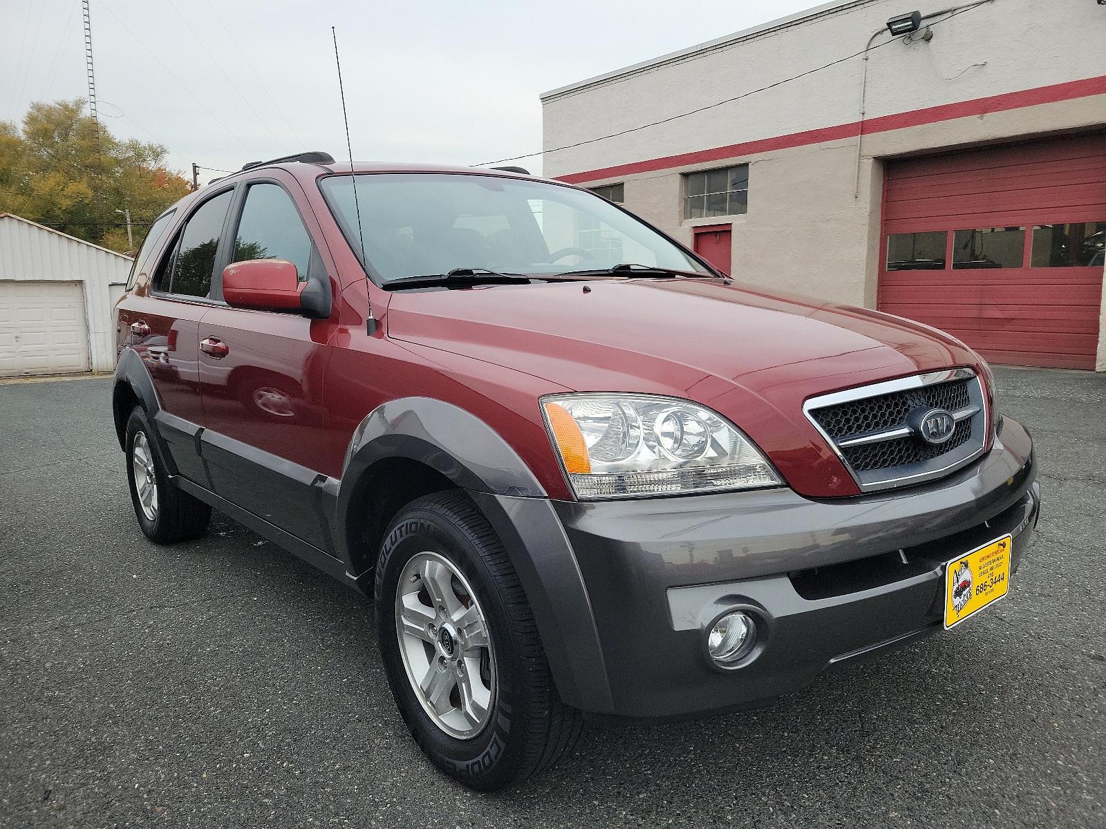 2005 Radiant Red - 3X /Gray - CY Kia Sorento EX (KNDJC733155) with an 3.5L DOHC MPFI 24-valve V6 engine engine, located at 50 Eastern Blvd., Essex, MD, 21221, (410) 686-3444, 39.304367, -76.484947 - Experience the dependable quality of this immaculate 2005 Kia Sorento EX 4dr ex 4wd auto. Boasting a radiant red 3x exterior, this stylish SUV surely stands out on the road. Step inside and appreciate the tastefully designed gray cy interior, offering comfort and functionality for all your travels. - Photo #2