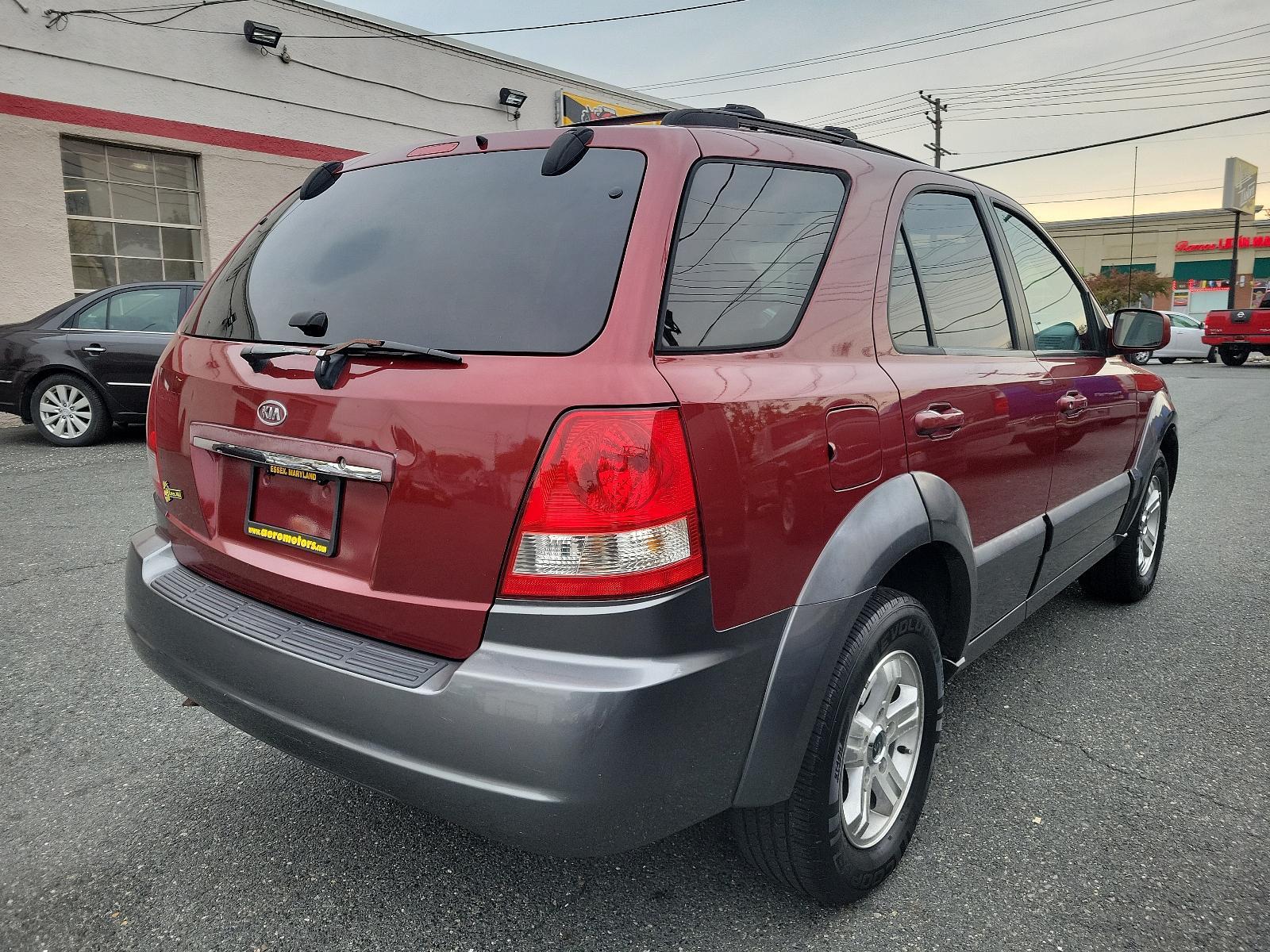 2005 Radiant Red - 3X /Gray - CY Kia Sorento EX (KNDJC733155) with an 3.5L DOHC MPFI 24-valve V6 engine engine, located at 50 Eastern Blvd., Essex, MD, 21221, (410) 686-3444, 39.304367, -76.484947 - Experience the dependable quality of this immaculate 2005 Kia Sorento EX 4dr ex 4wd auto. Boasting a radiant red 3x exterior, this stylish SUV surely stands out on the road. Step inside and appreciate the tastefully designed gray cy interior, offering comfort and functionality for all your travels. - Photo #3