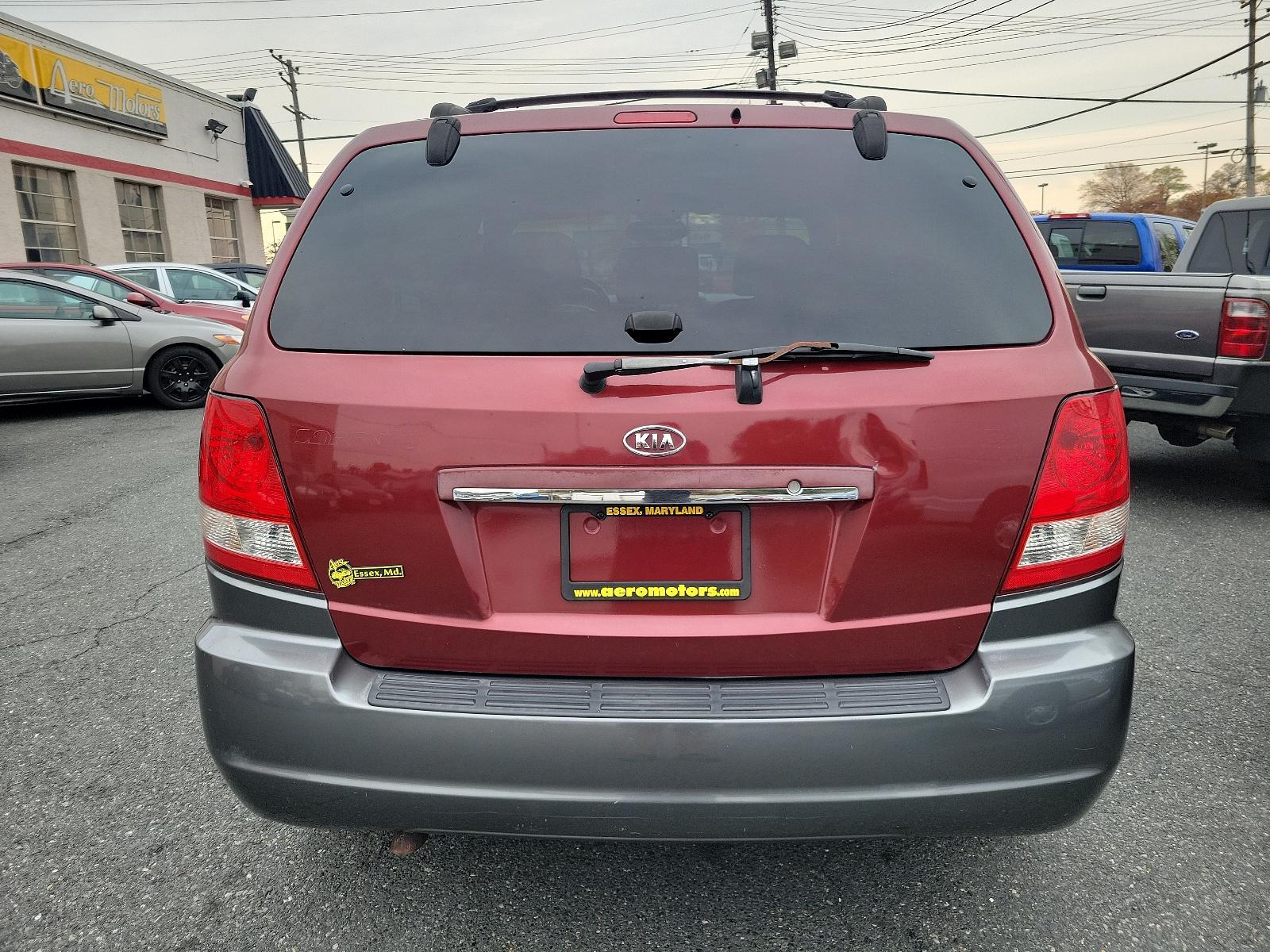 2005 Radiant Red - 3X /Gray - CY Kia Sorento EX (KNDJC733155) with an 3.5L DOHC MPFI 24-valve V6 engine engine, located at 50 Eastern Blvd., Essex, MD, 21221, (410) 686-3444, 39.304367, -76.484947 - Experience the dependable quality of this immaculate 2005 Kia Sorento EX 4dr ex 4wd auto. Boasting a radiant red 3x exterior, this stylish SUV surely stands out on the road. Step inside and appreciate the tastefully designed gray cy interior, offering comfort and functionality for all your travels. - Photo #4