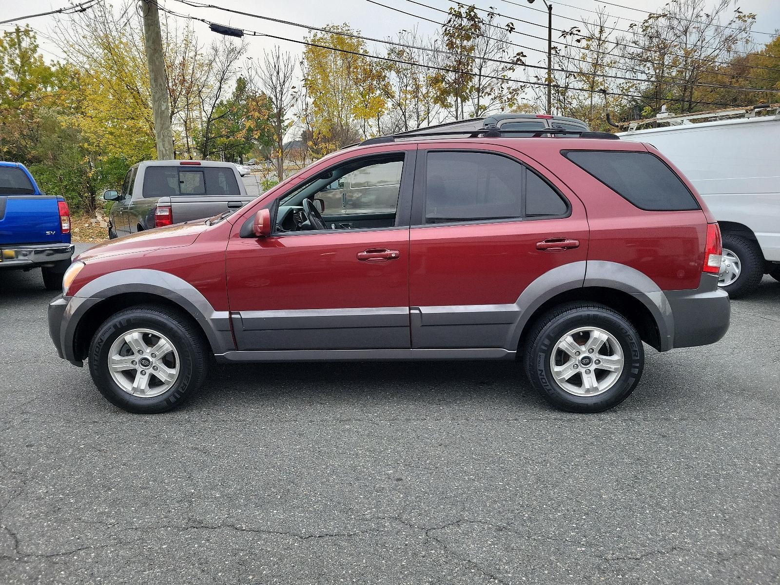 2005 Radiant Red - 3X /Gray - CY Kia Sorento EX (KNDJC733155) with an 3.5L DOHC MPFI 24-valve V6 engine engine, located at 50 Eastern Blvd., Essex, MD, 21221, (410) 686-3444, 39.304367, -76.484947 - Experience the dependable quality of this immaculate 2005 Kia Sorento EX 4dr ex 4wd auto. Boasting a radiant red 3x exterior, this stylish SUV surely stands out on the road. Step inside and appreciate the tastefully designed gray cy interior, offering comfort and functionality for all your travels. - Photo #6