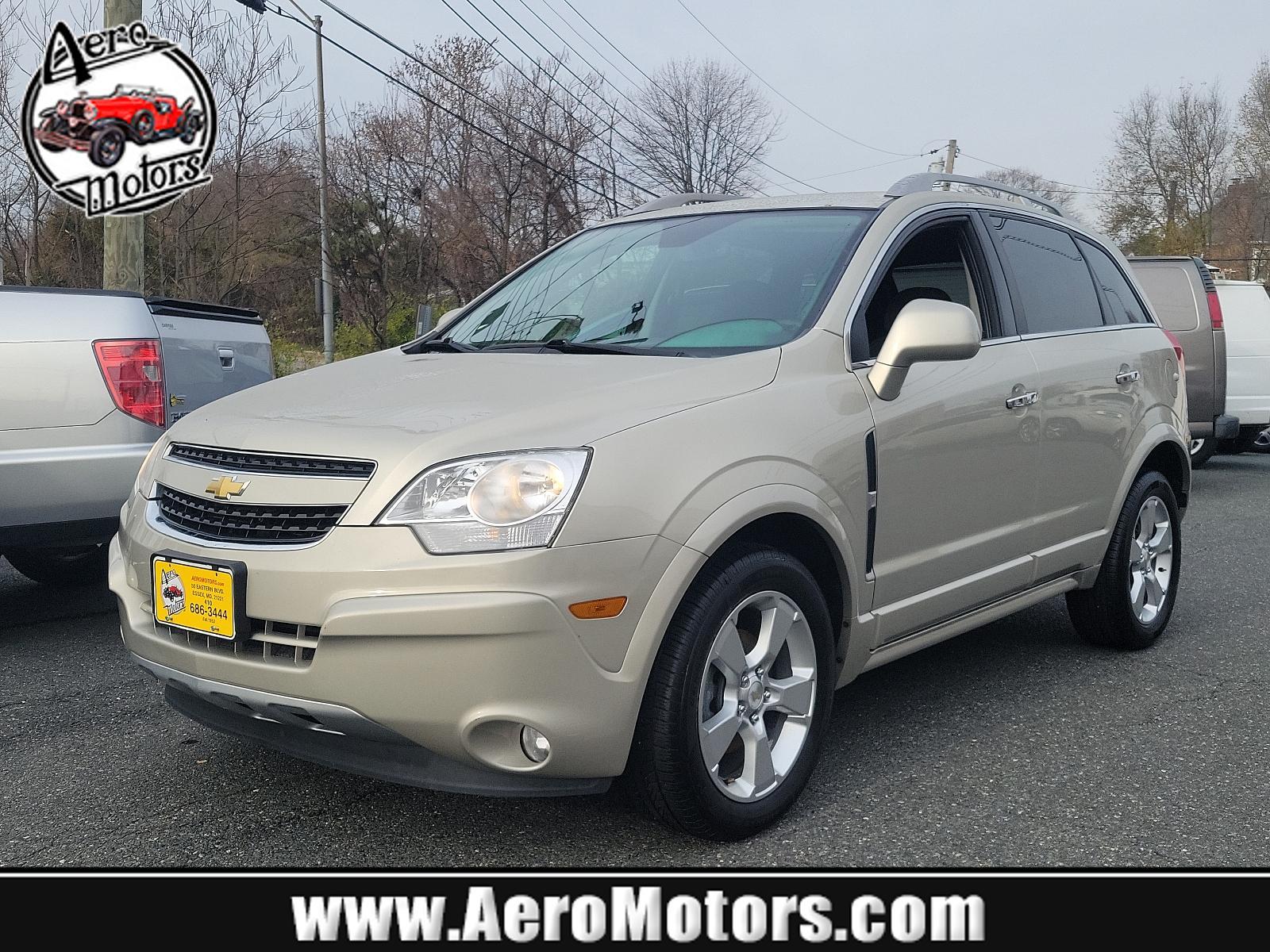 2014 Champagne Silver Metallic - GWT /Black - ADW Chevrolet Captiva Sport Fleet LT (3GNAL3EKXES) with an ENGINE, 2.4L DOHC 4-CYLINDER SIDI (SPARK IGNITION DIRECT INJECTION) engine, located at 50 Eastern Blvd., Essex, MD, 21221, (410) 686-3444, 39.304367, -76.484947 - Experience the perfect blend of performance and luxury with our 2014 Chevrolet Captiva Sport Fleet LT. This chic SUV boasts a stunning champagne silver metallic exterior complemented by a clean, sleek black interior. Propelled by a powerful 2.4L DOHC 4-cylinder SIDI (Spark Ignition Direct Injection) - Photo #0