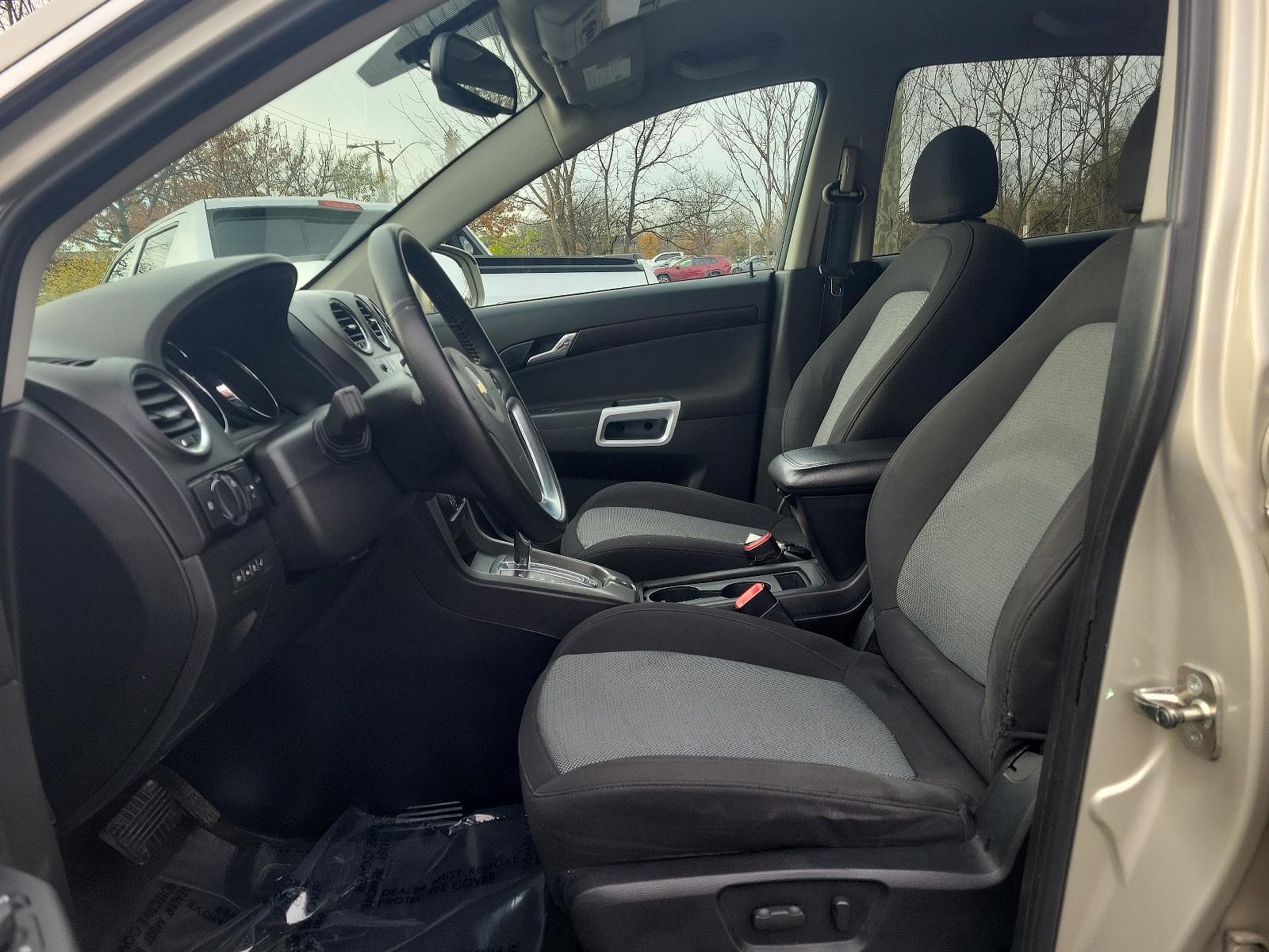 2014 Champagne Silver Metallic - GWT /Black - ADW Chevrolet Captiva Sport Fleet LT (3GNAL3EKXES) with an ENGINE, 2.4L DOHC 4-CYLINDER SIDI (SPARK IGNITION DIRECT INJECTION) engine, located at 50 Eastern Blvd., Essex, MD, 21221, (410) 686-3444, 39.304367, -76.484947 - Experience the perfect blend of performance and luxury with our 2014 Chevrolet Captiva Sport Fleet LT. This chic SUV boasts a stunning champagne silver metallic exterior complemented by a clean, sleek black interior. Propelled by a powerful 2.4L DOHC 4-cylinder SIDI (Spark Ignition Direct Injection) - Photo #12