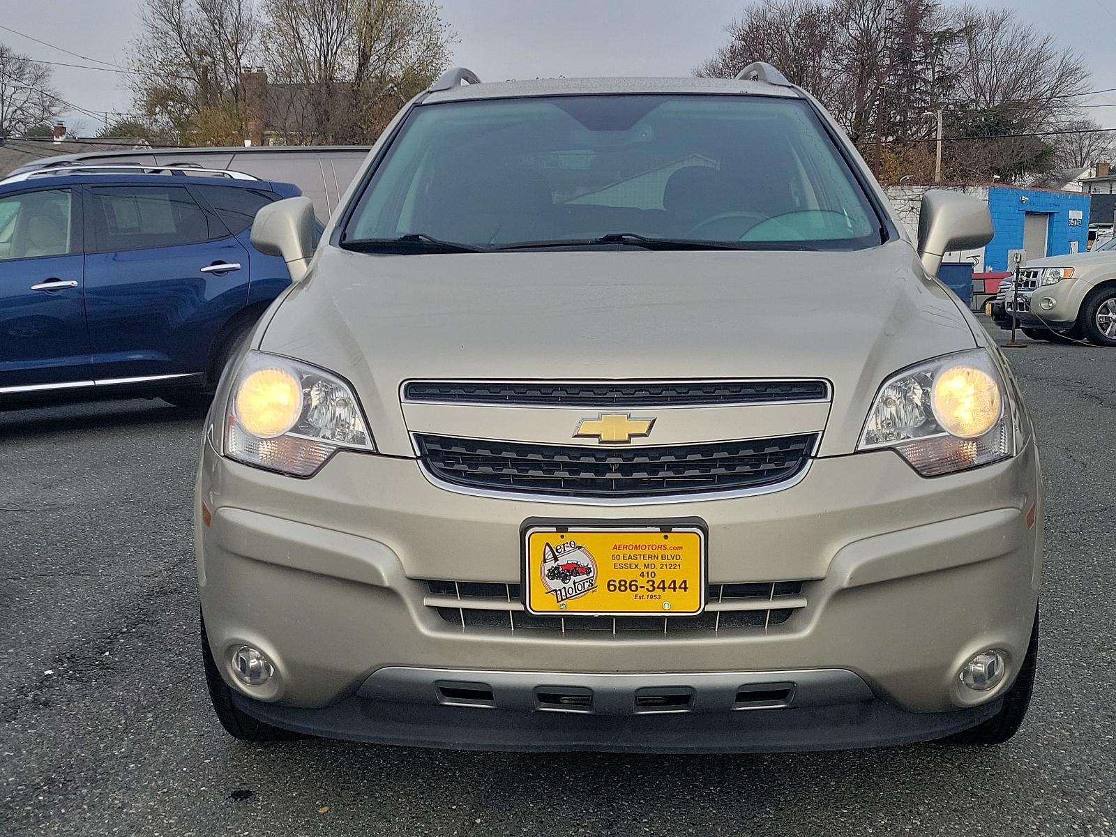 2014 Champagne Silver Metallic - GWT /Black - ADW Chevrolet Captiva Sport Fleet LT (3GNAL3EKXES) with an ENGINE, 2.4L DOHC 4-CYLINDER SIDI (SPARK IGNITION DIRECT INJECTION) engine, located at 50 Eastern Blvd., Essex, MD, 21221, (410) 686-3444, 39.304367, -76.484947 - Experience the perfect blend of performance and luxury with our 2014 Chevrolet Captiva Sport Fleet LT. This chic SUV boasts a stunning champagne silver metallic exterior complemented by a clean, sleek black interior. Propelled by a powerful 2.4L DOHC 4-cylinder SIDI (Spark Ignition Direct Injection) - Photo #1