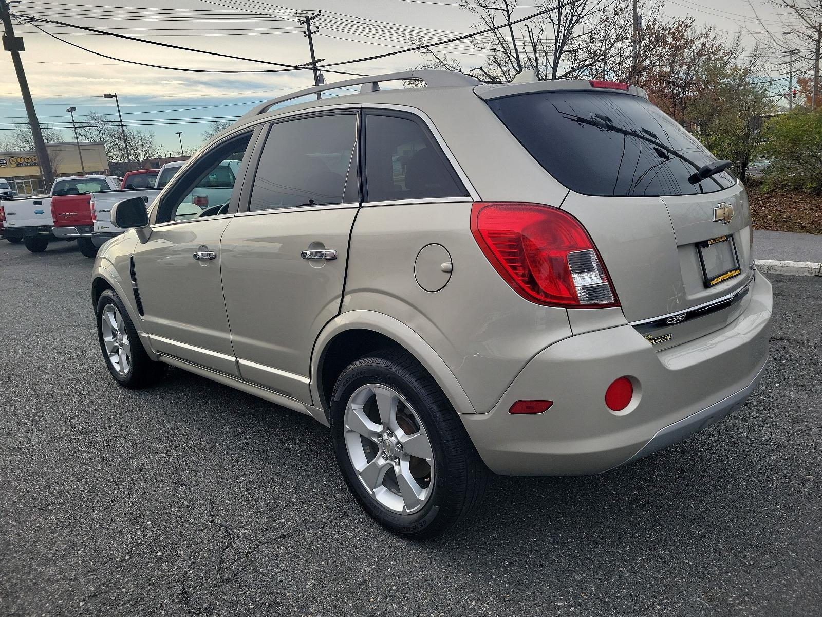 2014 Champagne Silver Metallic - GWT /Black - ADW Chevrolet Captiva Sport Fleet LT (3GNAL3EKXES) with an ENGINE, 2.4L DOHC 4-CYLINDER SIDI (SPARK IGNITION DIRECT INJECTION) engine, located at 50 Eastern Blvd., Essex, MD, 21221, (410) 686-3444, 39.304367, -76.484947 - Experience the perfect blend of performance and luxury with our 2014 Chevrolet Captiva Sport Fleet LT. This chic SUV boasts a stunning champagne silver metallic exterior complemented by a clean, sleek black interior. Propelled by a powerful 2.4L DOHC 4-cylinder SIDI (Spark Ignition Direct Injection) - Photo #5