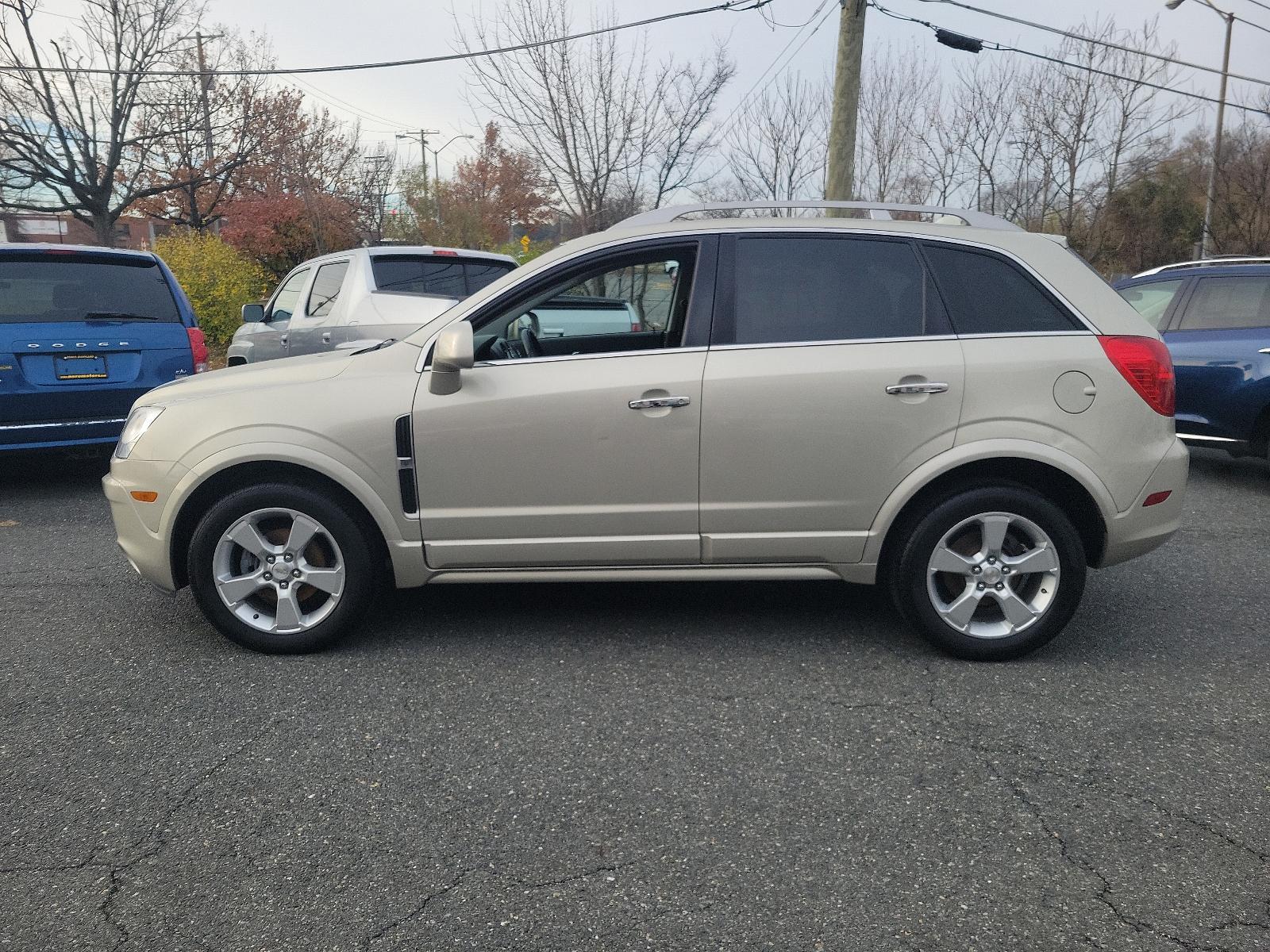 2014 Champagne Silver Metallic - GWT /Black - ADW Chevrolet Captiva Sport Fleet LT (3GNAL3EKXES) with an ENGINE, 2.4L DOHC 4-CYLINDER SIDI (SPARK IGNITION DIRECT INJECTION) engine, located at 50 Eastern Blvd., Essex, MD, 21221, (410) 686-3444, 39.304367, -76.484947 - Experience the perfect blend of performance and luxury with our 2014 Chevrolet Captiva Sport Fleet LT. This chic SUV boasts a stunning champagne silver metallic exterior complemented by a clean, sleek black interior. Propelled by a powerful 2.4L DOHC 4-cylinder SIDI (Spark Ignition Direct Injection) - Photo #6