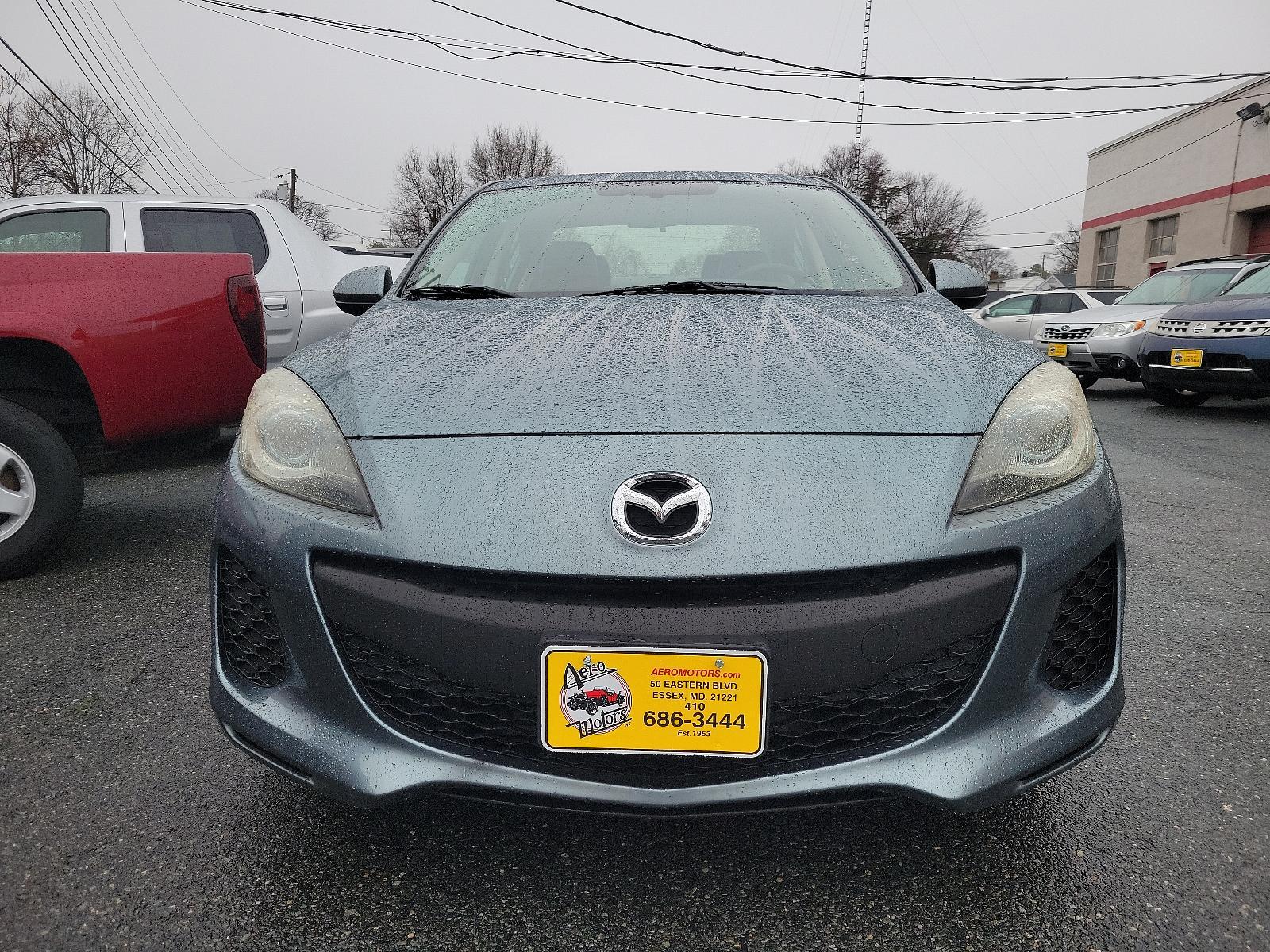 2012 Dolphin Gray Mica - 39T /Black - BU4 Mazda Mazda3 i Grand Touring (JM1BL1W88C1) with an 2.0L DOHC 16-valve SKYACTIV-G I4 engine -inc: variable valve timing (VVT) engine, located at 50 Eastern Blvd., Essex, MD, 21221, (410) 686-3444, 39.304367, -76.484947 - Discover the thrilling ride of the 2012 Mazda Mazda3 i Grand Touring 4dr Sedan Auto i Grand Touring. This vehicle showcases a sleek Dolphin Gray Mica-39T exterior, elegantly complemented by a sophisticated Black-BU4 interior that underlines its timeless appeal. Under the hood, you'll find the robust - Photo #1