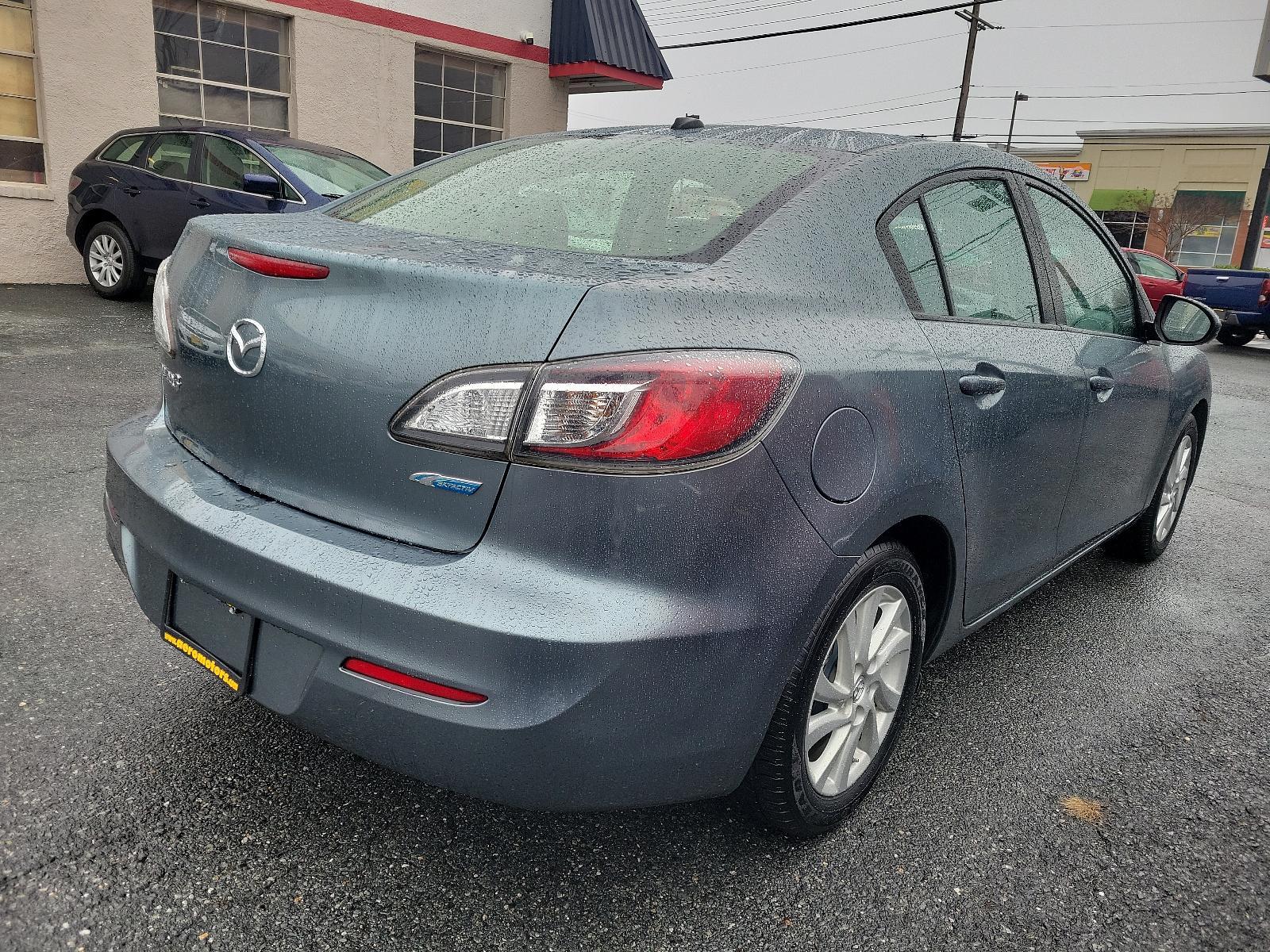 2012 Dolphin Gray Mica - 39T /Black - BU4 Mazda Mazda3 i Grand Touring (JM1BL1W88C1) with an 2.0L DOHC 16-valve SKYACTIV-G I4 engine -inc: variable valve timing (VVT) engine, located at 50 Eastern Blvd., Essex, MD, 21221, (410) 686-3444, 39.304367, -76.484947 - Discover the thrilling ride of the 2012 Mazda Mazda3 i Grand Touring 4dr Sedan Auto i Grand Touring. This vehicle showcases a sleek Dolphin Gray Mica-39T exterior, elegantly complemented by a sophisticated Black-BU4 interior that underlines its timeless appeal. Under the hood, you'll find the robust - Photo #3
