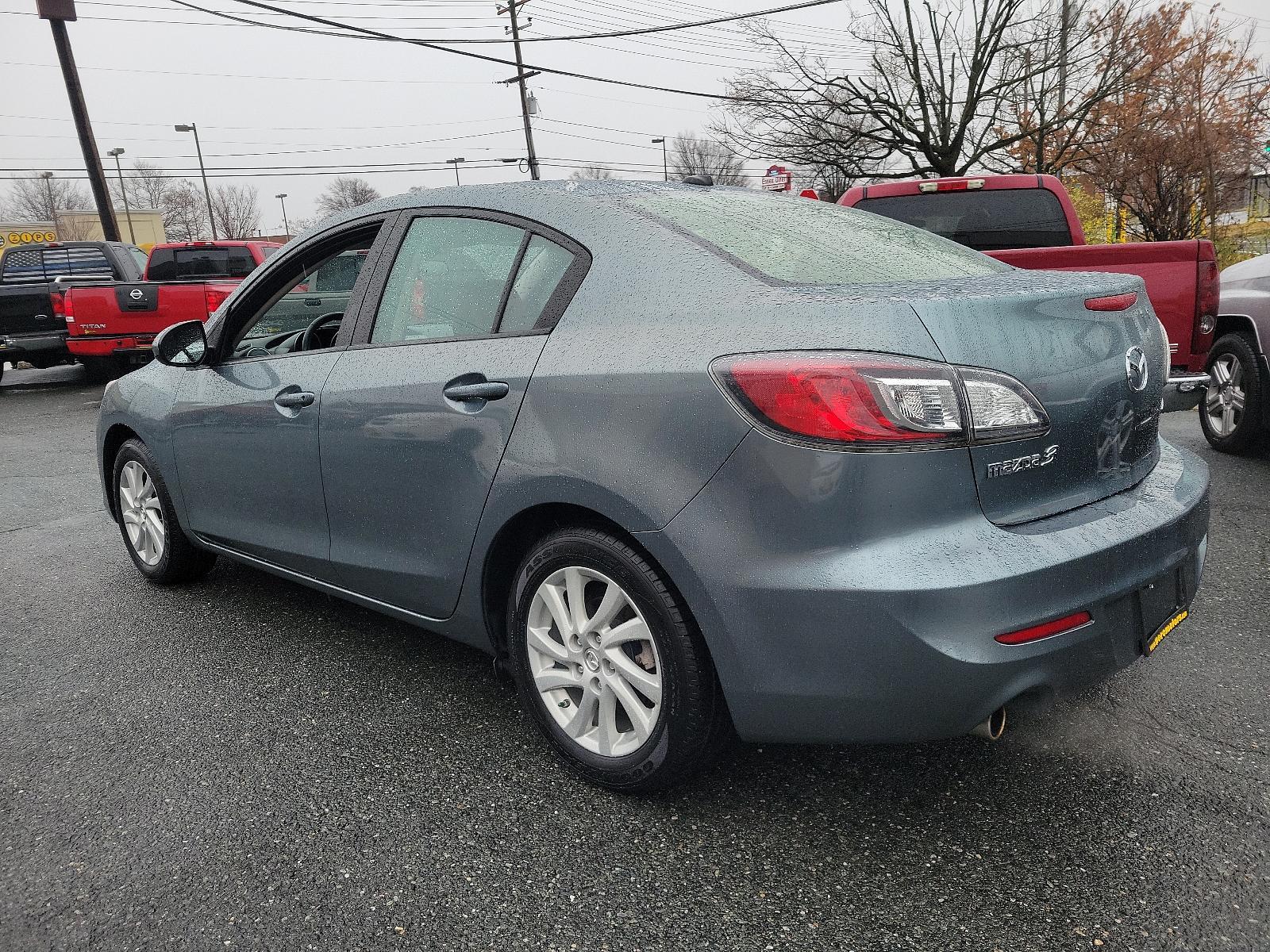 2012 Dolphin Gray Mica - 39T /Black - BU4 Mazda Mazda3 i Grand Touring (JM1BL1W88C1) with an 2.0L DOHC 16-valve SKYACTIV-G I4 engine -inc: variable valve timing (VVT) engine, located at 50 Eastern Blvd., Essex, MD, 21221, (410) 686-3444, 39.304367, -76.484947 - Discover the thrilling ride of the 2012 Mazda Mazda3 i Grand Touring 4dr Sedan Auto i Grand Touring. This vehicle showcases a sleek Dolphin Gray Mica-39T exterior, elegantly complemented by a sophisticated Black-BU4 interior that underlines its timeless appeal. Under the hood, you'll find the robust - Photo #5