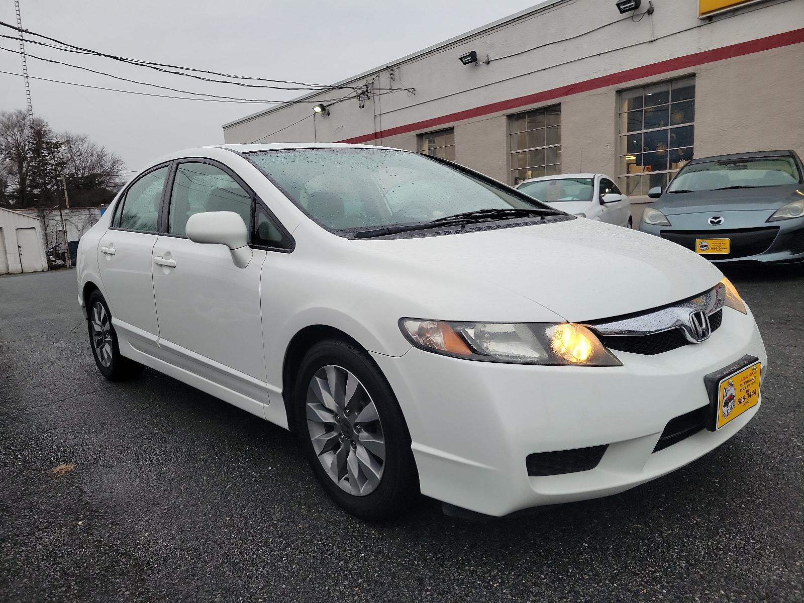 2011 Taffeta White - WH /Gray - GR Honda Civic Sdn EX (2HGFA1F85BH) with an 1.8L SOHC MPFI 16-valve i-VTEC I4 engine engine, located at 50 Eastern Blvd., Essex, MD, 21221, (410) 686-3444, 39.304367, -76.484947 - Experience style, performance, and value with this 2011 Honda Civic Sdn. Coated in a sleek white exterior, this Honda Civic articulates class and sophistication. A beacon of efficiency, it offers powerful performance while still delivering impressive fuel efficiency. Detailed with a well-maintained - Photo #2
