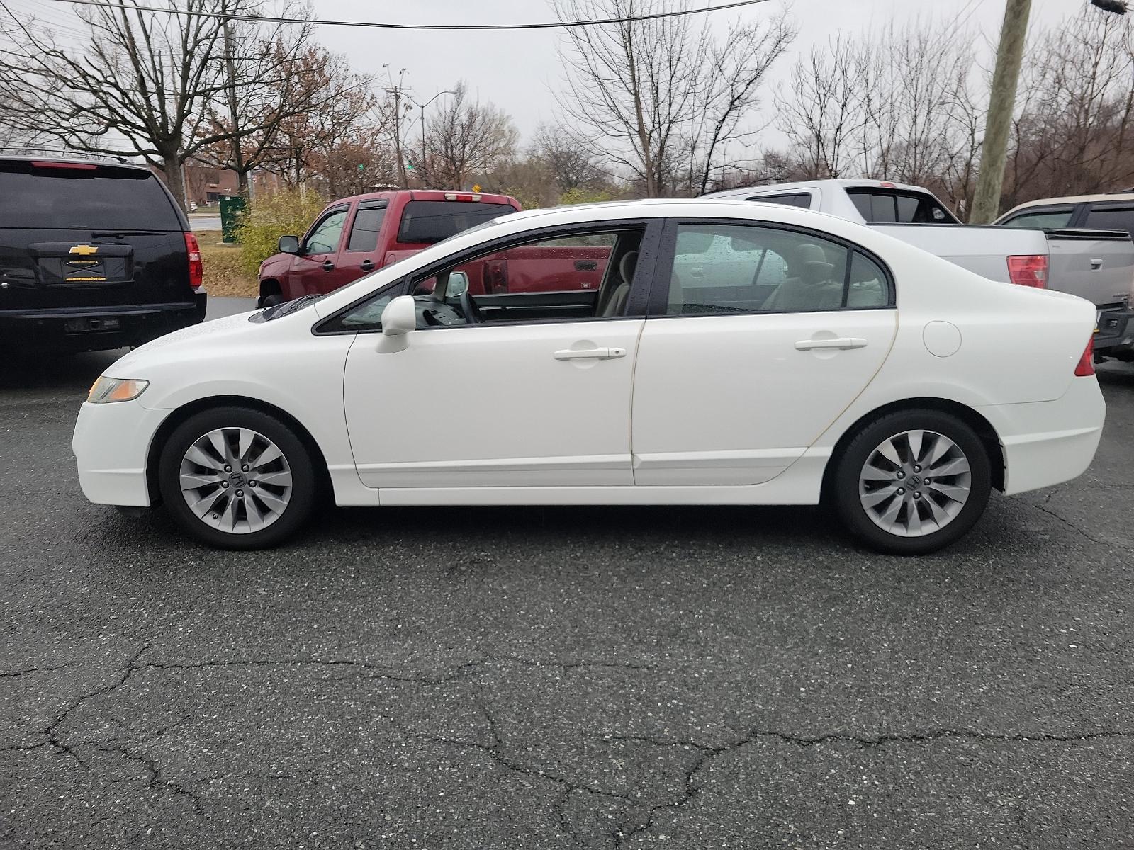 2011 Taffeta White - WH /Gray - GR Honda Civic Sdn EX (2HGFA1F85BH) with an 1.8L SOHC MPFI 16-valve i-VTEC I4 engine engine, located at 50 Eastern Blvd., Essex, MD, 21221, (410) 686-3444, 39.304367, -76.484947 - Experience style, performance, and value with this 2011 Honda Civic Sdn. Coated in a sleek white exterior, this Honda Civic articulates class and sophistication. A beacon of efficiency, it offers powerful performance while still delivering impressive fuel efficiency. Detailed with a well-maintained - Photo #6