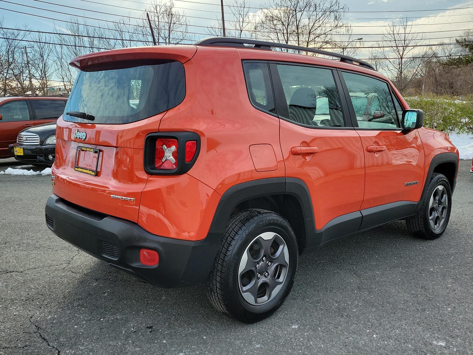 2016 Omaha Orange - PKP /Black - A7X9 Jeep Renegade Sport (ZACCJBAT1GP) with an ENGINE: 2.4L I4 MULTIAIR engine, located at 50 Eastern Blvd., Essex, MD, 21221, (410) 686-3444, 39.304367, -76.484947 - Introducing the 2016 Jeep Renegade Sport 4WD 4dr Sport, a striking silhouette presenting a pure embodiment of the adventurous spirit inherent to the Jeep Brand. Exuding strength and confidence, its Omaha Orange - PKP exterior immediately demands attention with its distinctive rugged appeal. This m - Photo #3
