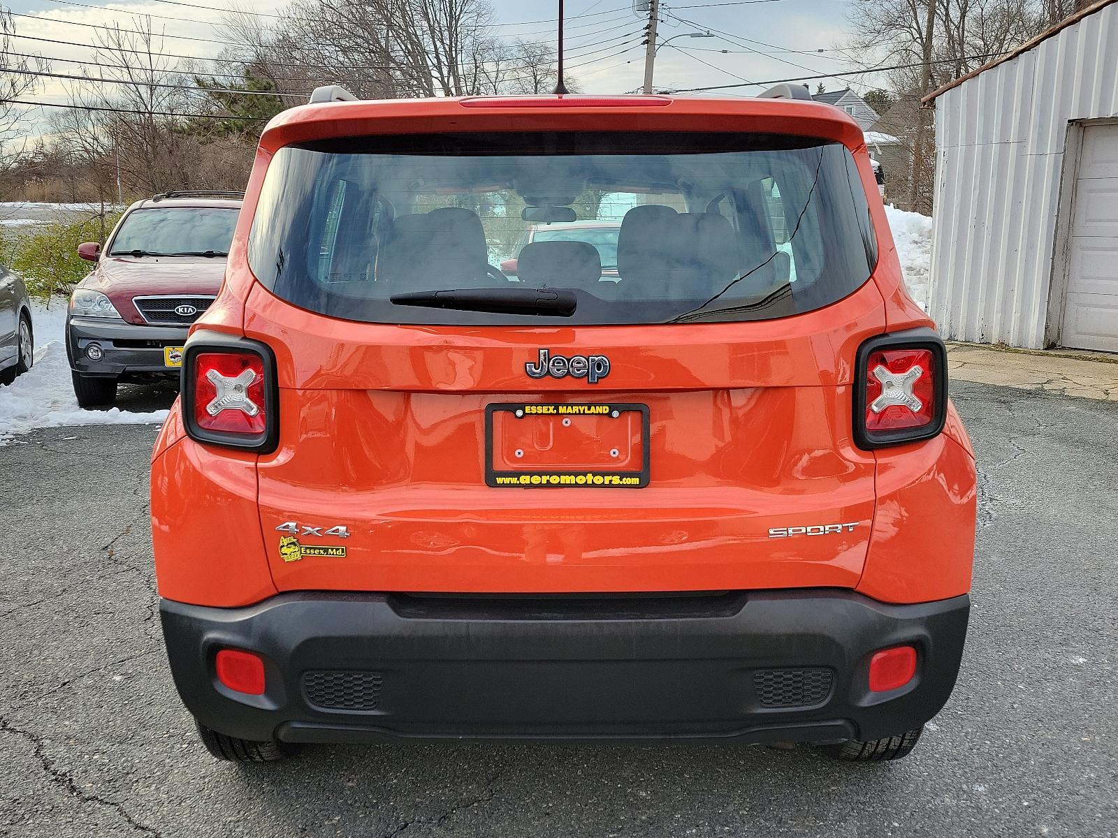 2016 Omaha Orange - PKP /Black - A7X9 Jeep Renegade Sport (ZACCJBAT1GP) with an ENGINE: 2.4L I4 MULTIAIR engine, located at 50 Eastern Blvd., Essex, MD, 21221, (410) 686-3444, 39.304367, -76.484947 - Introducing the 2016 Jeep Renegade Sport 4WD 4dr Sport, a striking silhouette presenting a pure embodiment of the adventurous spirit inherent to the Jeep Brand. Exuding strength and confidence, its Omaha Orange - PKP exterior immediately demands attention with its distinctive rugged appeal. This m - Photo #4