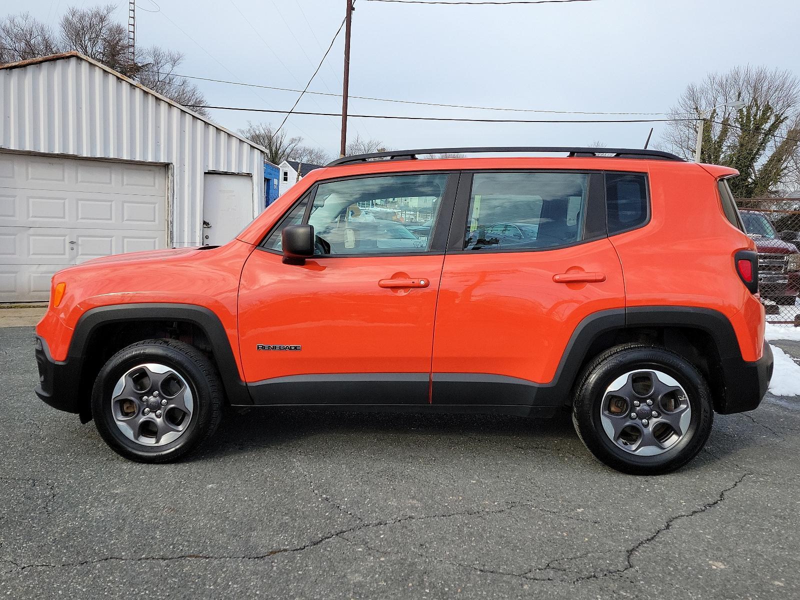 2016 Omaha Orange - PKP /Black - A7X9 Jeep Renegade Sport (ZACCJBAT1GP) with an ENGINE: 2.4L I4 MULTIAIR engine, located at 50 Eastern Blvd., Essex, MD, 21221, (410) 686-3444, 39.304367, -76.484947 - Introducing the 2016 Jeep Renegade Sport 4WD 4dr Sport, a striking silhouette presenting a pure embodiment of the adventurous spirit inherent to the Jeep Brand. Exuding strength and confidence, its Omaha Orange - PKP exterior immediately demands attention with its distinctive rugged appeal. This m - Photo #6