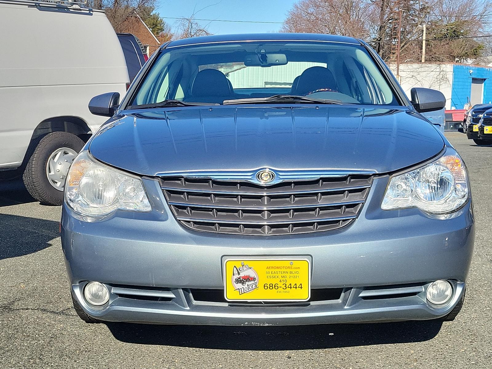 2007 Silver Steel Metallic - PA4 /Dark/Light Slate Gray - DB Chrysler Sebring Sdn Limited (1C3LC66K57N) with an 2.4L SMPI DOHC 16-VALVE I4 DUAL VVT ENGINE engine, located at 50 Eastern Blvd., Essex, MD, 21221, (410) 686-3444, 39.304367, -76.484947 - Discover the perfect blend of style, comfort and performance with this 2007 Chrysler Sebring Sdn Limited 4dr. Finished in an alluring Silver Steel Metallic - PA4 exterior paired beautifully with the plush Dark/Light Slate Gray - DB interior, it exhibits a sleek, chic aesthetic that's sure to turn he - Photo #1