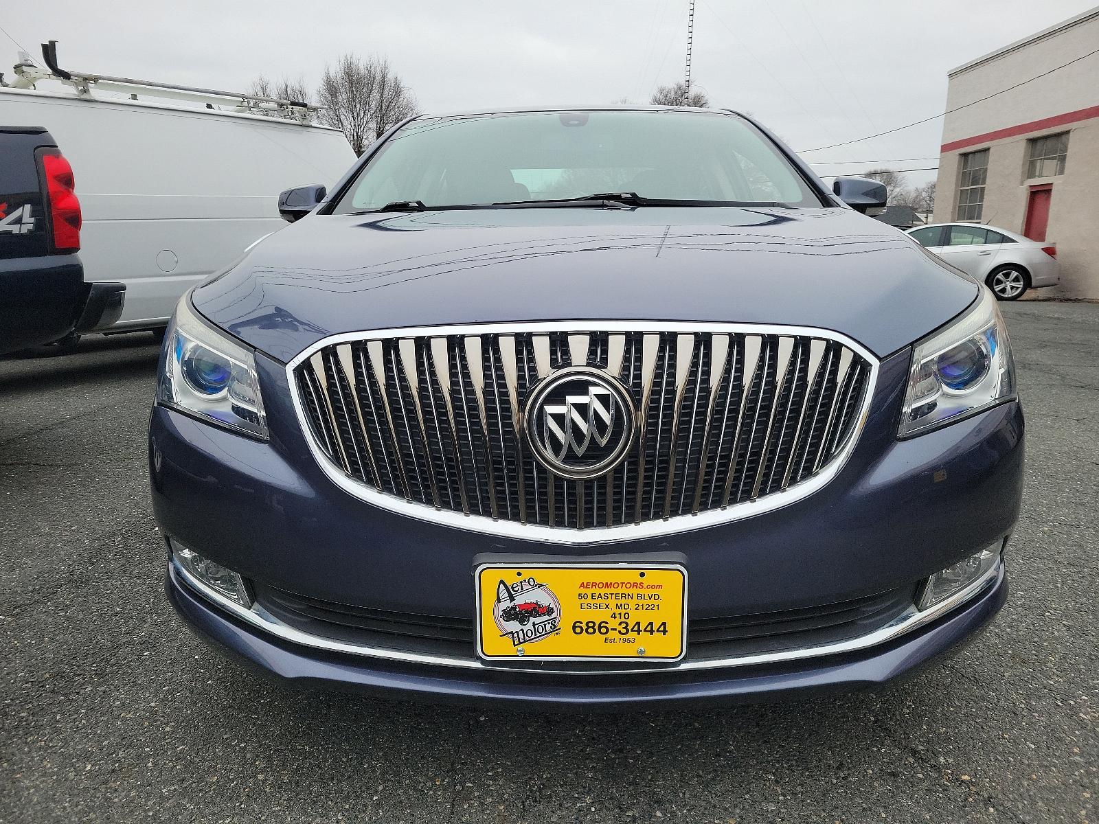 2014 Atlantis Blue Metallic - GWY /Ebony - H0Y Buick LaCrosse Leather (1G4GB5G3XEF) with an ENGINE, 3.6L SIDI DOHC V6 VVT engine, located at 50 Eastern Blvd., Essex, MD, 21221, (410) 686-3444, 39.304367, -76.484947 - Experience the epitome of luxury and performance with our stunning 2014 Buick LaCrosse Leather 4dr Sedan. Rising above the ordinary with an eye-catching Atlantis Blue Metallic exterior, this car is a proud testament to Buick's classic aesthetics. Complementing the beautiful exterior is an Ebony inte - Photo #1