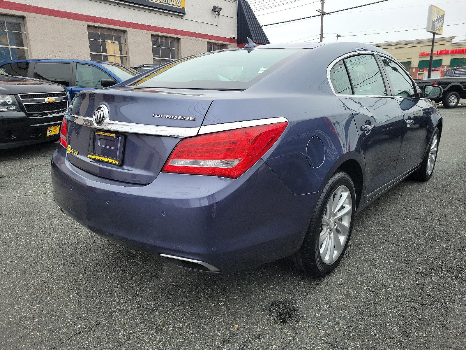 2014 Atlantis Blue Metallic - GWY /Ebony - H0Y Buick LaCrosse Leather (1G4GB5G3XEF) with an ENGINE, 3.6L SIDI DOHC V6 VVT engine, located at 50 Eastern Blvd., Essex, MD, 21221, (410) 686-3444, 39.304367, -76.484947 - Experience the epitome of luxury and performance with our stunning 2014 Buick LaCrosse Leather 4dr Sedan. Rising above the ordinary with an eye-catching Atlantis Blue Metallic exterior, this car is a proud testament to Buick's classic aesthetics. Complementing the beautiful exterior is an Ebony inte - Photo #3