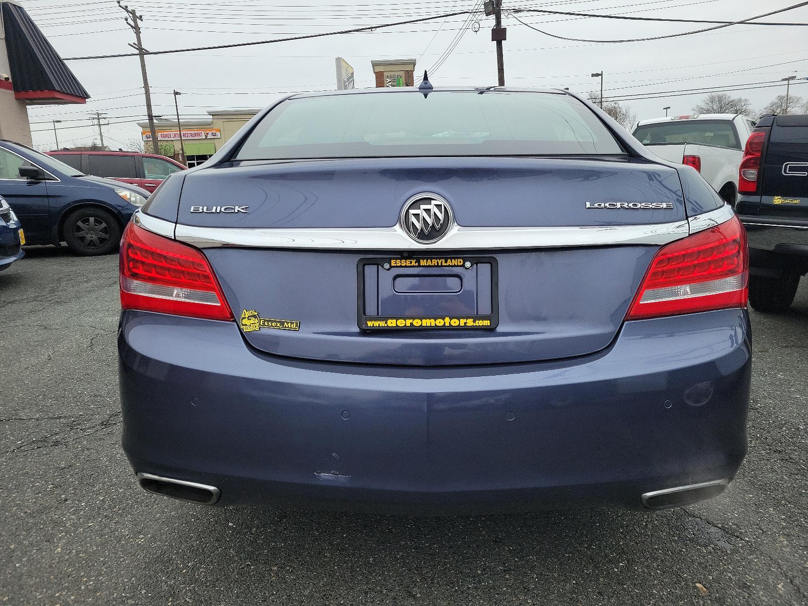 2014 Atlantis Blue Metallic - GWY /Ebony - H0Y Buick LaCrosse Leather (1G4GB5G3XEF) with an ENGINE, 3.6L SIDI DOHC V6 VVT engine, located at 50 Eastern Blvd., Essex, MD, 21221, (410) 686-3444, 39.304367, -76.484947 - Experience the epitome of luxury and performance with our stunning 2014 Buick LaCrosse Leather 4dr Sedan. Rising above the ordinary with an eye-catching Atlantis Blue Metallic exterior, this car is a proud testament to Buick's classic aesthetics. Complementing the beautiful exterior is an Ebony inte - Photo #4