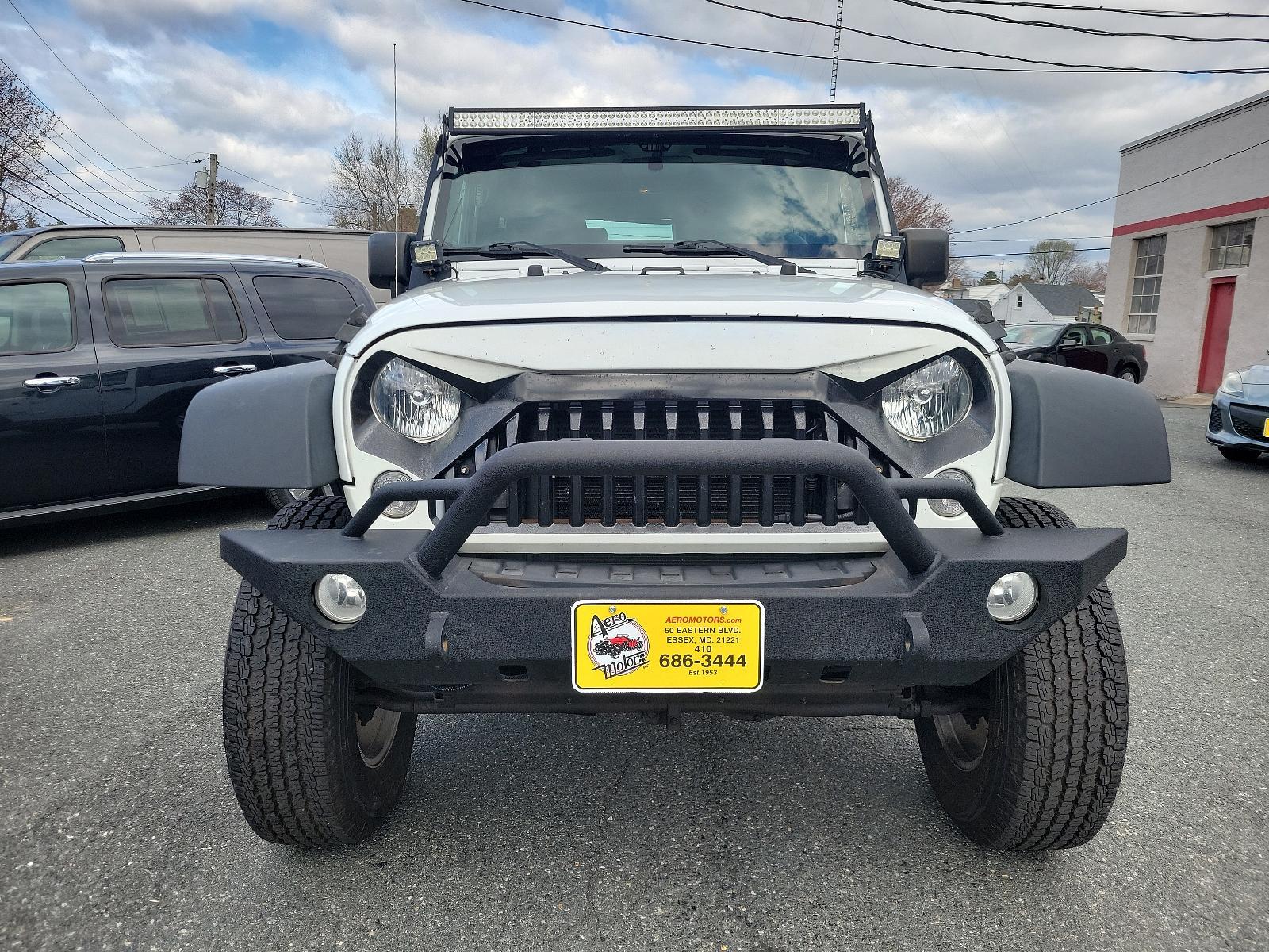 2015 Bright White Clearcoat - PW7 /Black - A7X9 Jeep Wrangler Sport (1C4AJWAGXFL) with an ENGINE: 3.6L V6 24V VVT engine, located at 50 Eastern Blvd., Essex, MD, 21221, (410) 686-3444, 39.304367, -76.484947 - Experience the thrill of off-road adventure with the 2015 Jeep Wrangler Sport 4WD 2dr Sport. This bold, white clearcoat exterior vehicle is powered by a 3.6L V6 24V VVT engine, ensuring unparalleled performance on any landscape. The accent-black interior imbues sophistication and comfort throughout - Photo #1