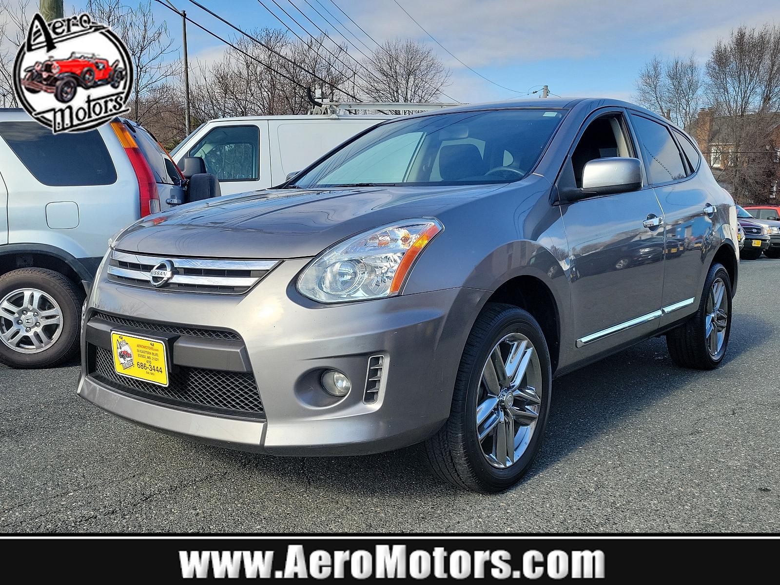 2011 Platinum Graphite - K51 /Black - G Nissan Rogue Krom Edition (JN8AS5MV7BW) with an 2.5L DOHC SMPI 16-valve I4 engine engine, located at 50 Eastern Blvd., Essex, MD, 21221, (410) 686-3444, 39.304367, -76.484947 - Experience the unique blend of style, comfort, and performance with this 2011 Nissan Rogue Krom Edition AWD. Powered by a robust 2.5L DOHC SMPI 16-valve I4 engine, this compact SUV delivers unparalleled handling and fuel efficiency. This special Krom Edition stands out with its Platinum Graphite ext - Photo #0