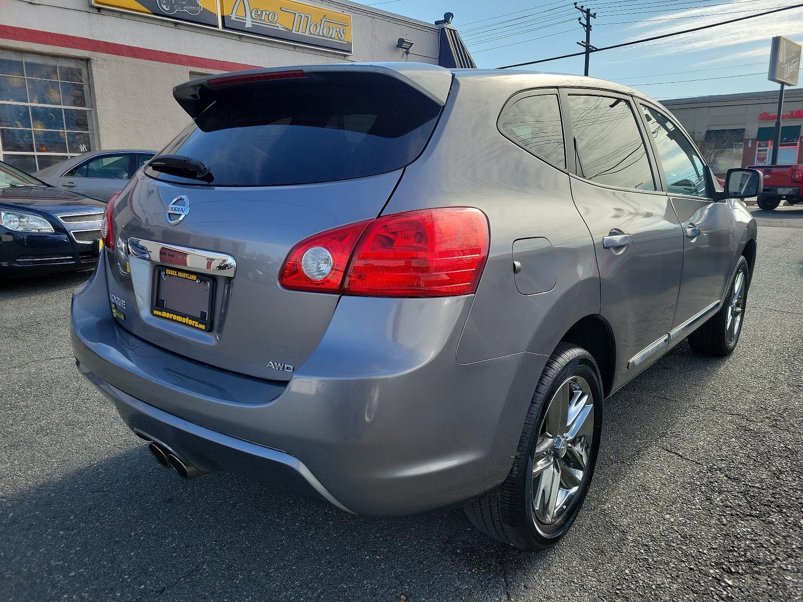 2011 Platinum Graphite - K51 /Black - G Nissan Rogue Krom Edition (JN8AS5MV7BW) with an 2.5L DOHC SMPI 16-valve I4 engine engine, located at 50 Eastern Blvd., Essex, MD, 21221, (410) 686-3444, 39.304367, -76.484947 - Experience the unique blend of style, comfort, and performance with this 2011 Nissan Rogue Krom Edition AWD. Powered by a robust 2.5L DOHC SMPI 16-valve I4 engine, this compact SUV delivers unparalleled handling and fuel efficiency. This special Krom Edition stands out with its Platinum Graphite ext - Photo #3