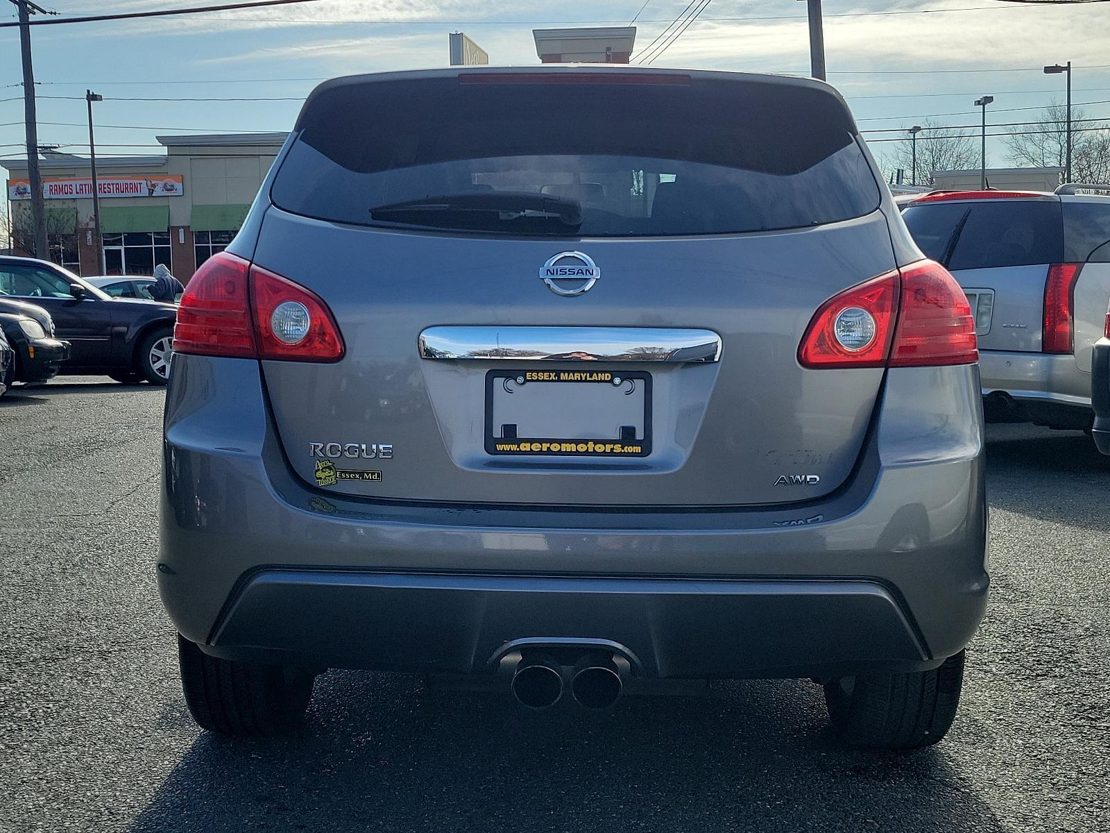 2011 Platinum Graphite - K51 /Black - G Nissan Rogue Krom Edition (JN8AS5MV7BW) with an 2.5L DOHC SMPI 16-valve I4 engine engine, located at 50 Eastern Blvd., Essex, MD, 21221, (410) 686-3444, 39.304367, -76.484947 - Experience the unique blend of style, comfort, and performance with this 2011 Nissan Rogue Krom Edition AWD. Powered by a robust 2.5L DOHC SMPI 16-valve I4 engine, this compact SUV delivers unparalleled handling and fuel efficiency. This special Krom Edition stands out with its Platinum Graphite ext - Photo #4