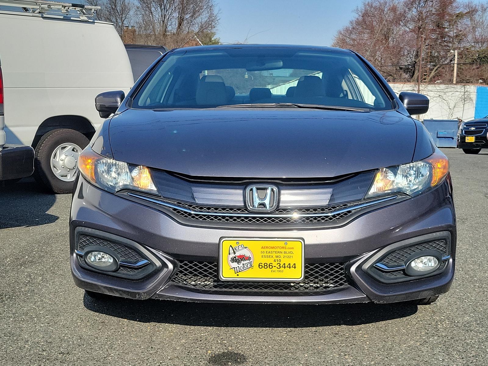 2015 Modern Steel Metallic - GX /Gray - GR Honda Civic Coupe EX-L (2HGFG3B05FH) with an Engine: 1.8L I-4 SOHC 16-Valve i-VTEC engine, located at 50 Eastern Blvd., Essex, MD, 21221, (410) 686-3444, 39.304367, -76.484947 - Experience superior performance and stylish comfort with the 2015 Honda Civic Coupe EX-L. Dressed elegantly in a modern steel metallic GX exterior, this coupe boasts a slick design that never goes unnoticed. Its inviting interior is swathed in refined gray tones, presenting a harmonious blend of sty - Photo #1