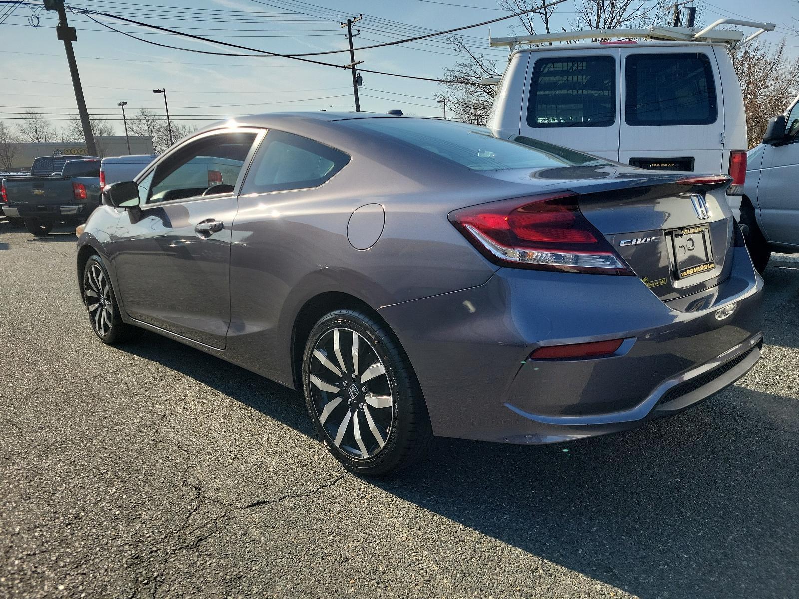 2015 Modern Steel Metallic - GX /Gray - GR Honda Civic Coupe EX-L (2HGFG3B05FH) with an Engine: 1.8L I-4 SOHC 16-Valve i-VTEC engine, located at 50 Eastern Blvd., Essex, MD, 21221, (410) 686-3444, 39.304367, -76.484947 - Experience superior performance and stylish comfort with the 2015 Honda Civic Coupe EX-L. Dressed elegantly in a modern steel metallic GX exterior, this coupe boasts a slick design that never goes unnoticed. Its inviting interior is swathed in refined gray tones, presenting a harmonious blend of sty - Photo #5