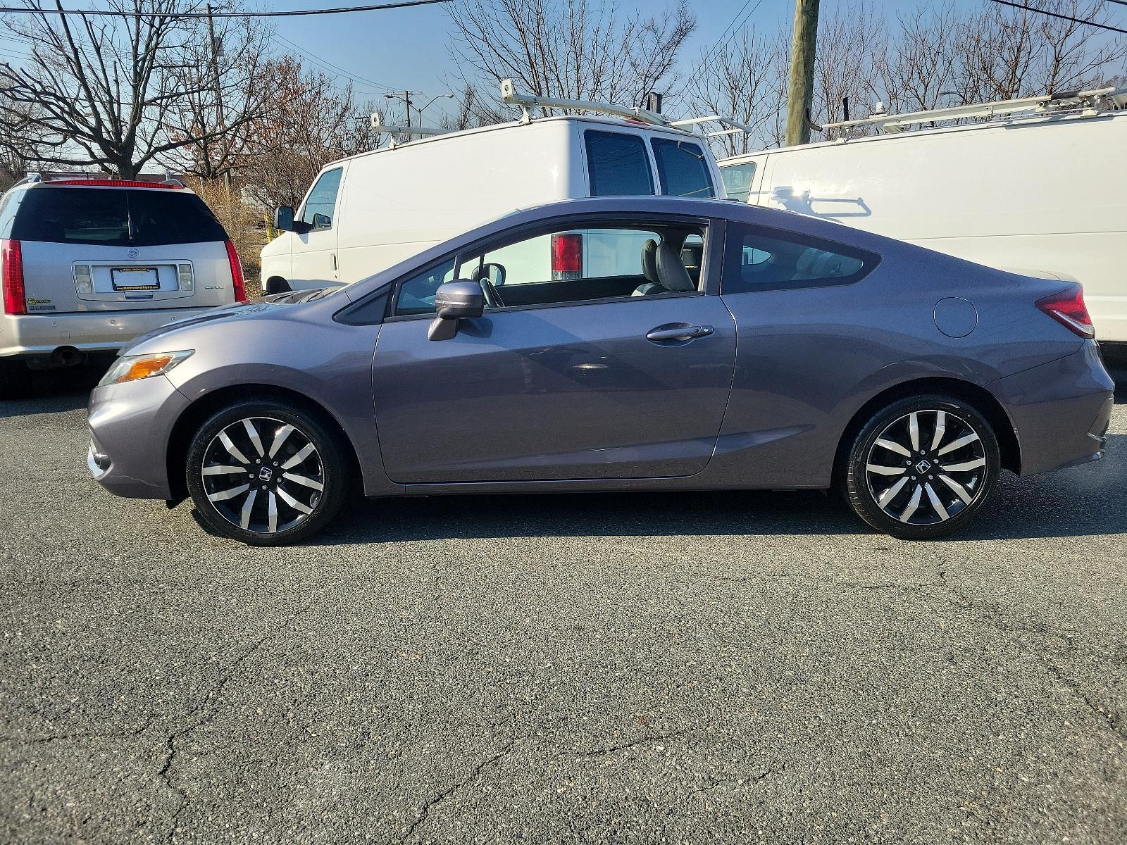 2015 Modern Steel Metallic - GX /Gray - GR Honda Civic Coupe EX-L (2HGFG3B05FH) with an Engine: 1.8L I-4 SOHC 16-Valve i-VTEC engine, located at 50 Eastern Blvd., Essex, MD, 21221, (410) 686-3444, 39.304367, -76.484947 - Experience superior performance and stylish comfort with the 2015 Honda Civic Coupe EX-L. Dressed elegantly in a modern steel metallic GX exterior, this coupe boasts a slick design that never goes unnoticed. Its inviting interior is swathed in refined gray tones, presenting a harmonious blend of sty - Photo #6