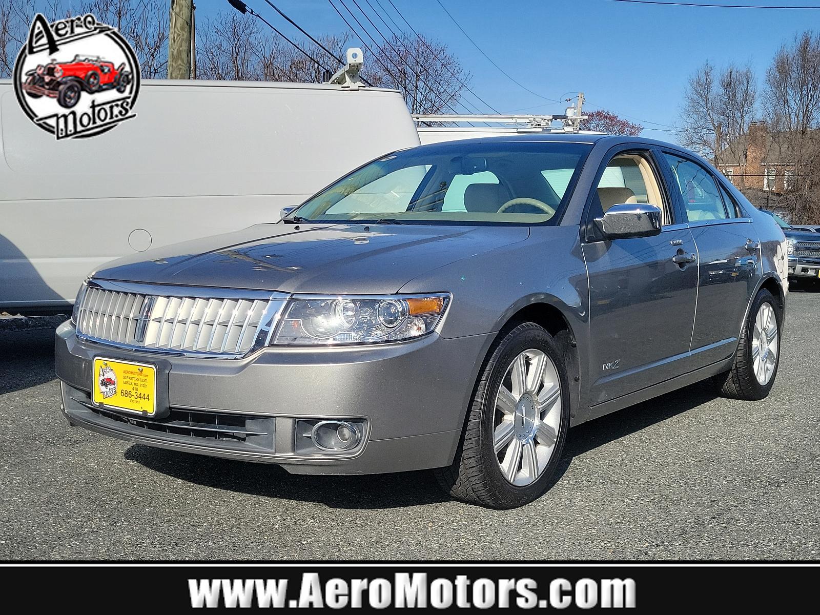 2008 Vapor Silver Metallic - ZY /Sand - S Lincoln MKZ (3LNHM26TX8R) with an 3.5L DOHC 24-VALVE V6 DURATEC ENGINE engine, located at 50 Eastern Blvd., Essex, MD, 21221, (410) 686-3444, 39.304367, -76.484947 - Embrace elegance with this refined 2008 Lincoln MKZ. Resplendent in a sleek gray exterior, this 4-door sedan unifies classic style with modern functionality. Delve into the driving experience powered by a robust 3.5L DOHC 24-Valve V6 Duratec engine, earning high points on efficiency and performance. - Photo #0