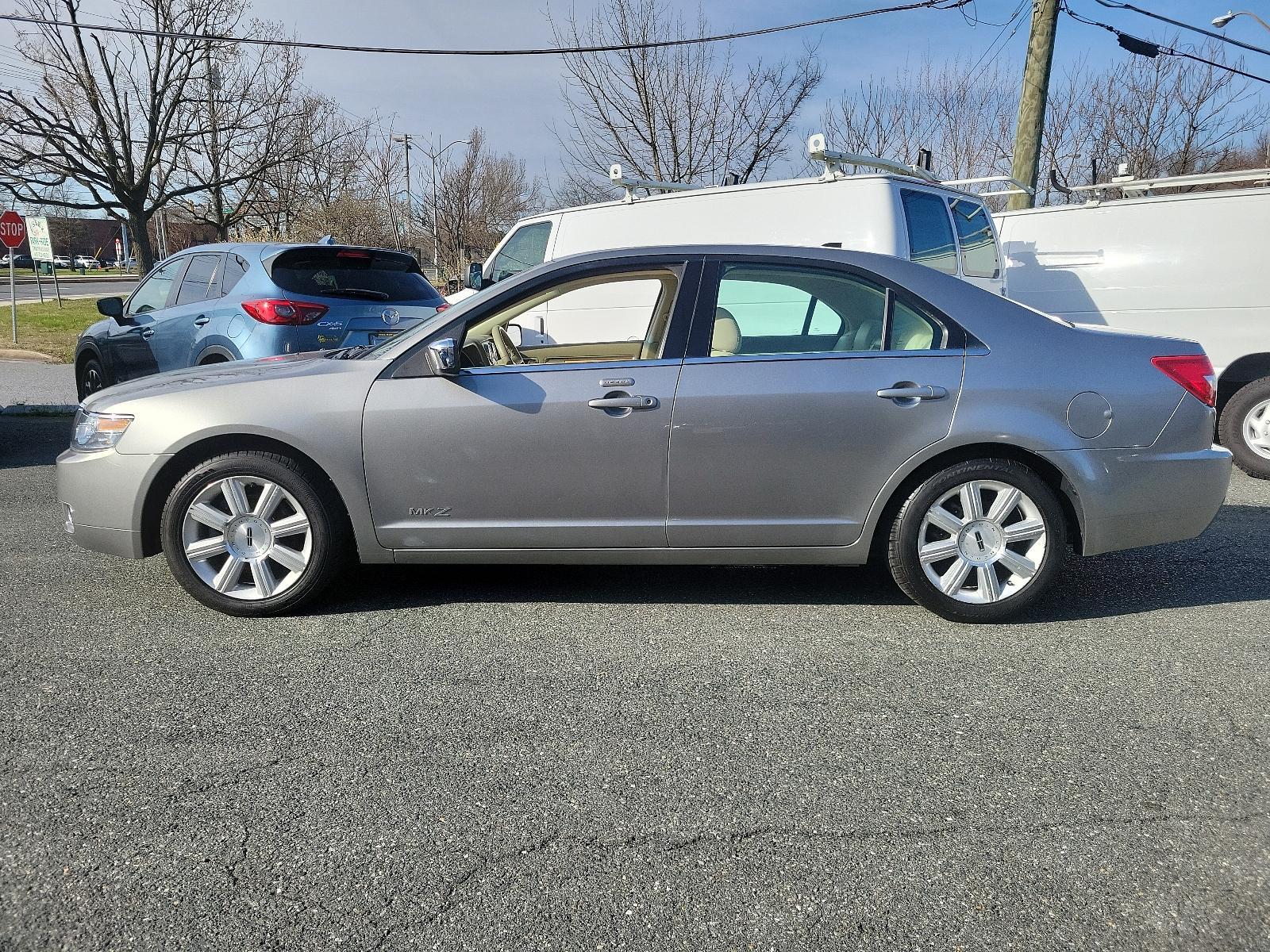 2008 Vapor Silver Metallic - ZY /Sand - S Lincoln MKZ (3LNHM26TX8R) with an 3.5L DOHC 24-VALVE V6 DURATEC ENGINE engine, located at 50 Eastern Blvd., Essex, MD, 21221, (410) 686-3444, 39.304367, -76.484947 - Embrace elegance with this refined 2008 Lincoln MKZ. Resplendent in a sleek gray exterior, this 4-door sedan unifies classic style with modern functionality. Delve into the driving experience powered by a robust 3.5L DOHC 24-Valve V6 Duratec engine, earning high points on efficiency and performance. - Photo #6