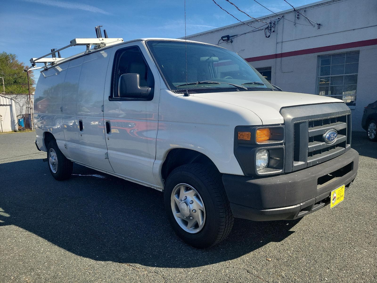 2014 Oxford White - YZ /Medium Flint - AE Ford Econoline Cargo Van Commercial (1FTNE1EW6ED) with an ENGINE: 4.6L EFI V8 FFV CAPABLE engine, located at 50 Eastern Blvd., Essex, MD, 21221, (410) 686-3444, 39.304367, -76.484947 - Introducing the 2014 Ford Econoline E-150 Commercial Cargo Van, dressed in a pristine white exterior. This is a reliable powerhouse built to serve all your commercial needs. Under the hood sits a robust 4.6L EFI V8 FFV capable engine, designed for performance and efficiency, thereby reinforcing Ford - Photo #2