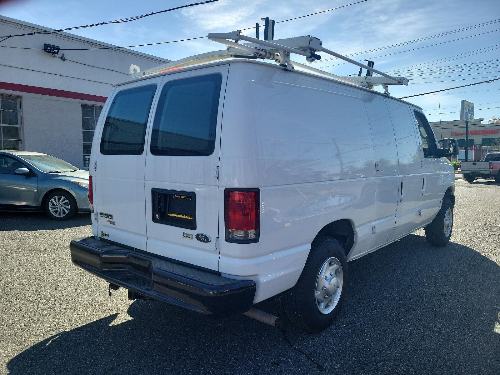 2014 Oxford White - YZ /Medium Flint - AE Ford Econoline Cargo Van Commercial (1FTNE1EW6ED) with an ENGINE: 4.6L EFI V8 FFV CAPABLE engine, located at 50 Eastern Blvd., Essex, MD, 21221, (410) 686-3444, 39.304367, -76.484947 - Introducing the 2014 Ford Econoline E-150 Commercial Cargo Van, dressed in a pristine white exterior. This is a reliable powerhouse built to serve all your commercial needs. Under the hood sits a robust 4.6L EFI V8 FFV capable engine, designed for performance and efficiency, thereby reinforcing Ford - Photo #3