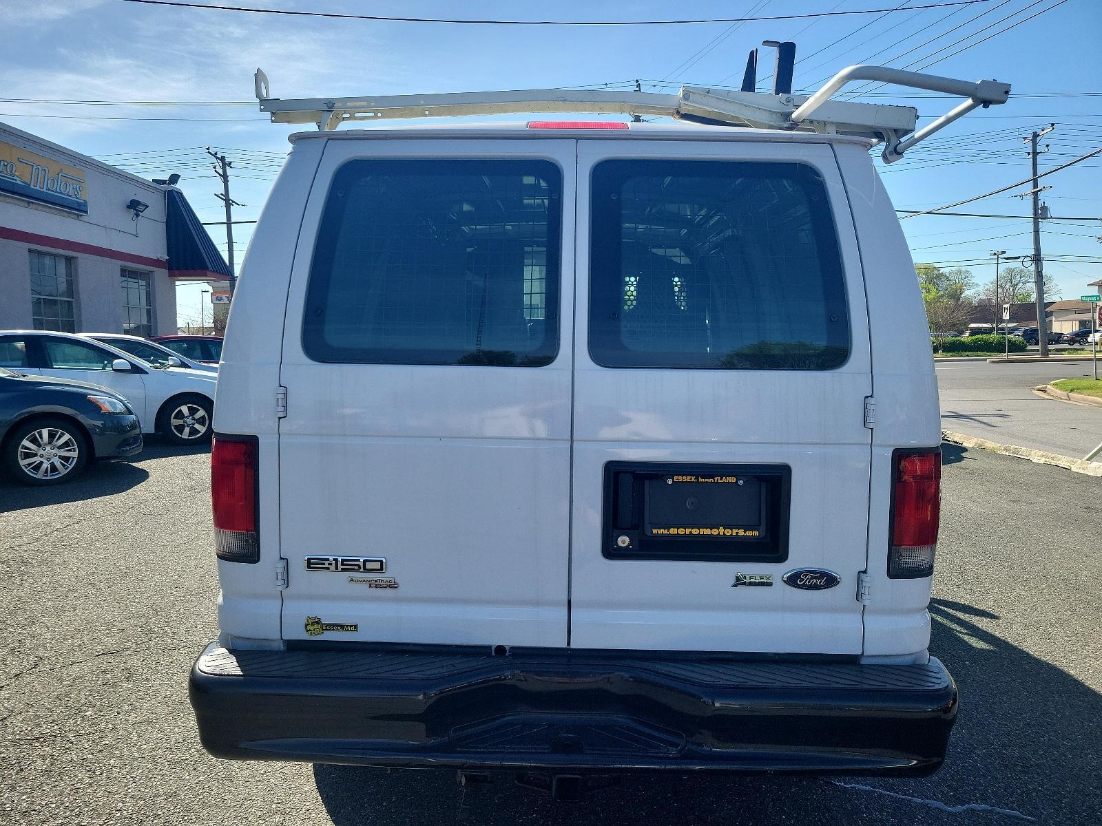 2014 Oxford White - YZ /Medium Flint - AE Ford Econoline Cargo Van Commercial (1FTNE1EW6ED) with an ENGINE: 4.6L EFI V8 FFV CAPABLE engine, located at 50 Eastern Blvd., Essex, MD, 21221, (410) 686-3444, 39.304367, -76.484947 - Introducing the 2014 Ford Econoline E-150 Commercial Cargo Van, dressed in a pristine white exterior. This is a reliable powerhouse built to serve all your commercial needs. Under the hood sits a robust 4.6L EFI V8 FFV capable engine, designed for performance and efficiency, thereby reinforcing Ford - Photo #4
