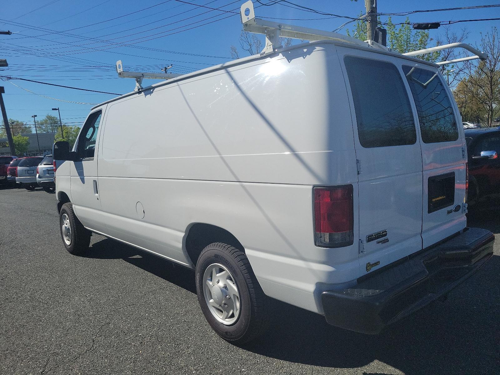 2014 Oxford White - YZ /Medium Flint - AE Ford Econoline Cargo Van Commercial (1FTNE1EW6ED) with an ENGINE: 4.6L EFI V8 FFV CAPABLE engine, located at 50 Eastern Blvd., Essex, MD, 21221, (410) 686-3444, 39.304367, -76.484947 - Introducing the 2014 Ford Econoline E-150 Commercial Cargo Van, dressed in a pristine white exterior. This is a reliable powerhouse built to serve all your commercial needs. Under the hood sits a robust 4.6L EFI V8 FFV capable engine, designed for performance and efficiency, thereby reinforcing Ford - Photo #5